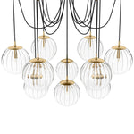 Featuring Spider Burnished Brass Clear Ribbon Glass Cord Chandelier by Four Hands at Amethyst Home. Clear glass spheres float at varying lengths for a statement-making piece. Each globe is individually blown, shaped and sculpted by hand through a one-hour process. Brass and glass are 98% recyclable. Designed and sustainably crafted in Poland by Schwung.. Amethyst Home provides interior design, new home construction design consulting, vintage area rugs, and lighting in the Winter Garden metro area.