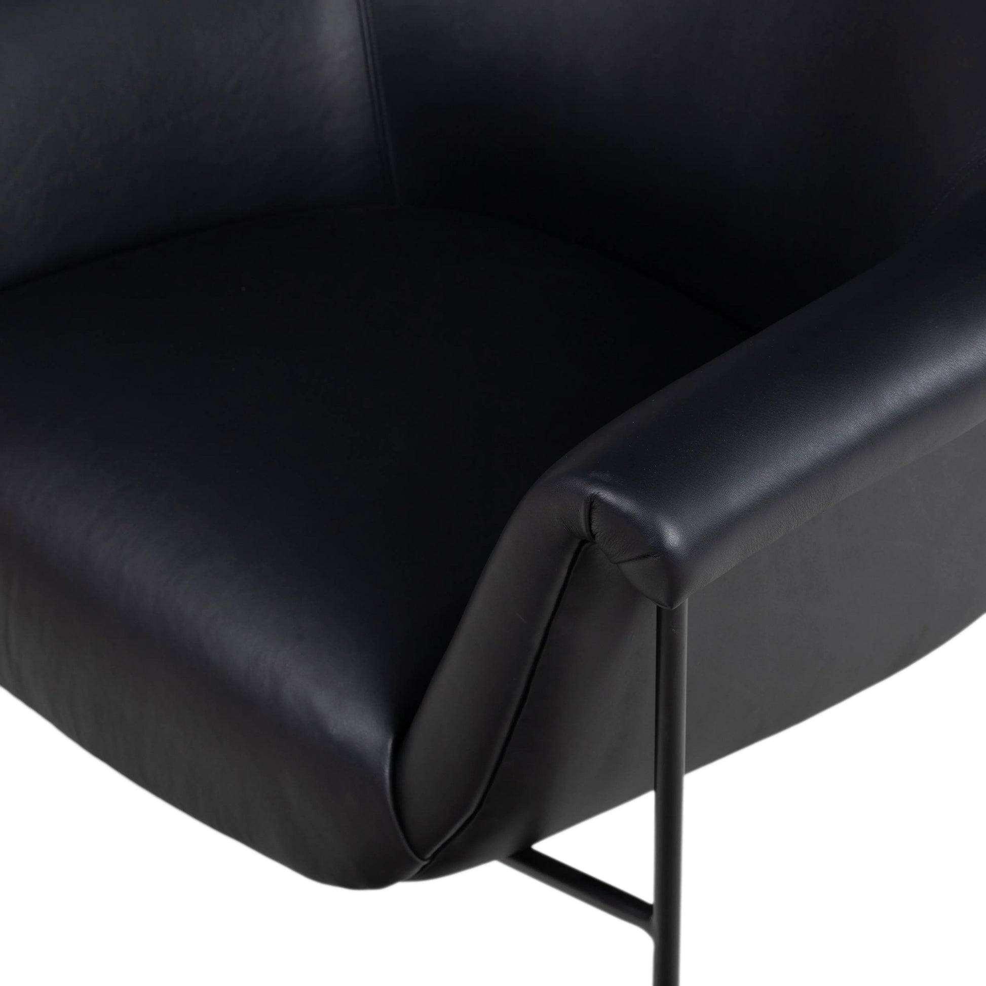 With a curvy silhouette and classic rolled arms, thick-cut top-grain leather brings a fresh feel to vintage-inspired accent seating, with an airy iron cradle base for a beautiful balance of scale Amethyst Home provides interior design, new home construction design consulting, vintage area rugs, and lighting in the Boston metro area.