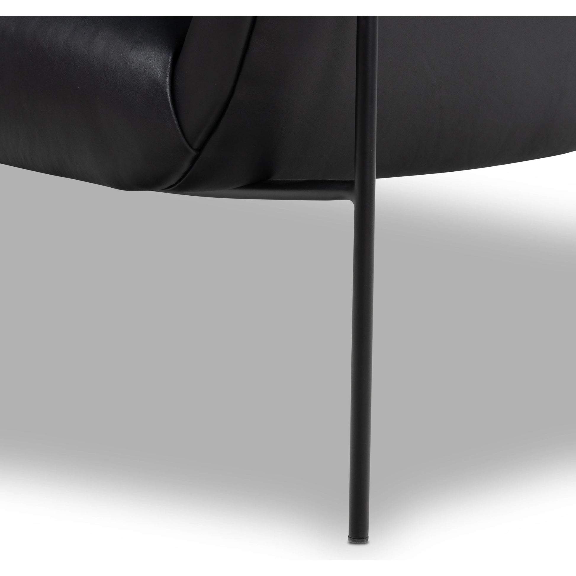 With a curvy silhouette and classic rolled arms, thick-cut top-grain leather brings a fresh feel to vintage-inspired accent seating, with an airy iron cradle base for a beautiful balance of scale Amethyst Home provides interior design, new home construction design consulting, vintage area rugs, and lighting in the Los Angeles metro area.