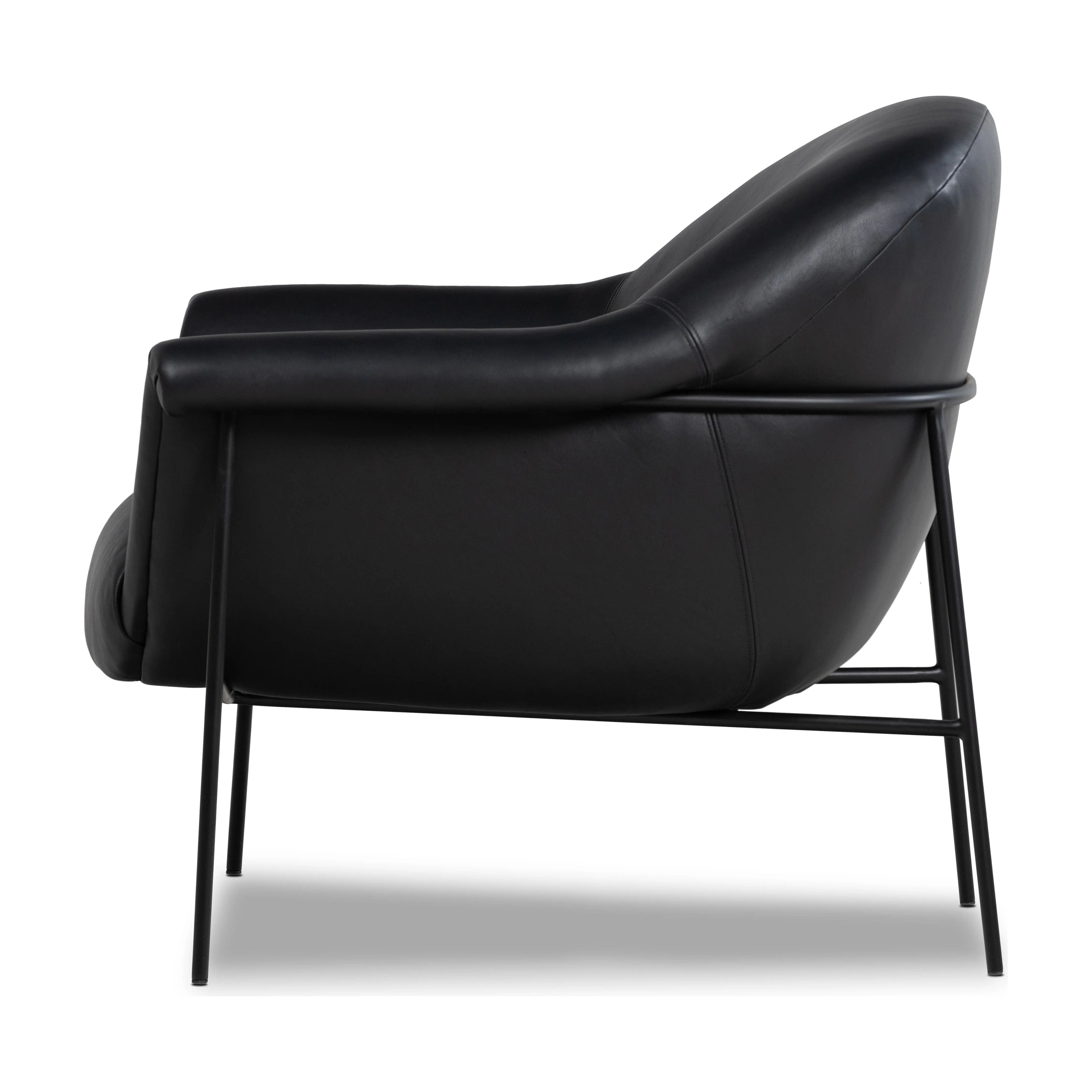 With a curvy silhouette and classic rolled arms, thick-cut top-grain leather brings a fresh feel to vintage-inspired accent seating, with an airy iron cradle base for a beautiful balance of scale Amethyst Home provides interior design, new home construction design consulting, vintage area rugs, and lighting in the Winter Garden metro area.