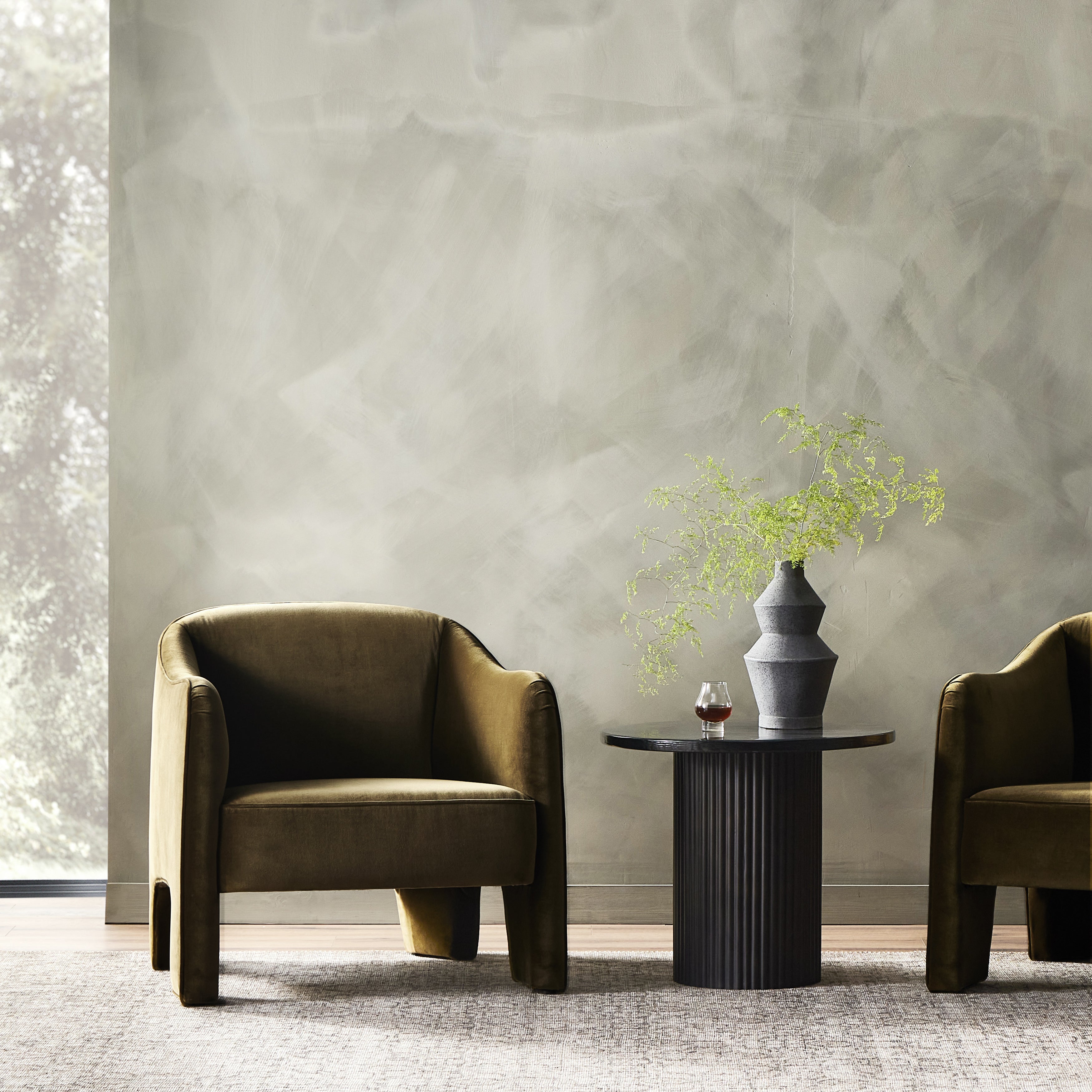 Featuring Sully Surrey Moss Chair by Four Hands at Amethyst Home. Shape-driven from top to bottom, this modern accent chair is tightly upholstered in a smooth cotton velvet fabric. Subtle highs and lows throughout the fabric change in appearance depending on the direction of the fabric's nap and the lighting in the room, bringing movement to the entire piece. S-spring construction en. Amethyst Home provides interior design, new construction, custom furniture, and area rugs in the Miami metro area.