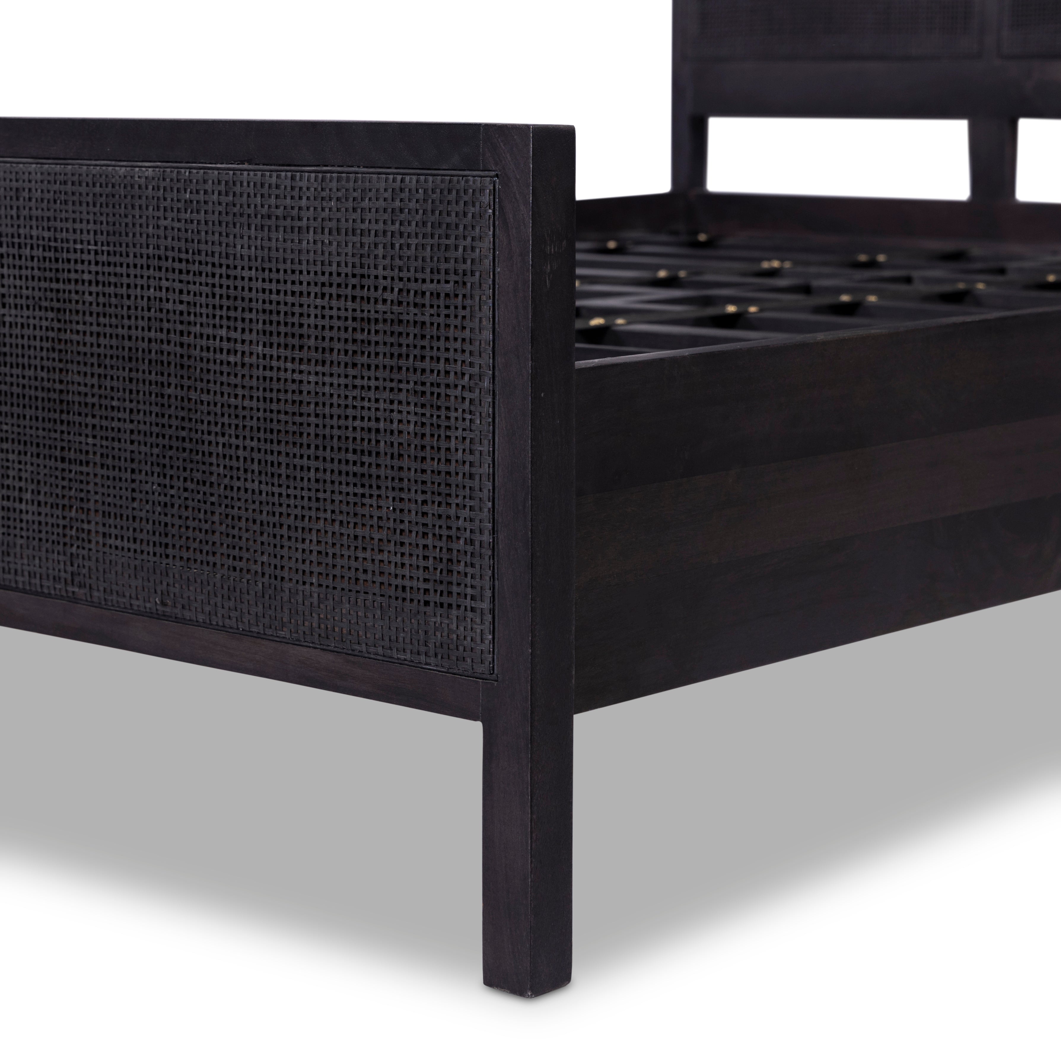 Black-washed mango frames an inset of black woven cane, for a textural, monochromatic look. Amethyst Home provides interior design, new construction, custom furniture, and area rugs in the Park City metro area.