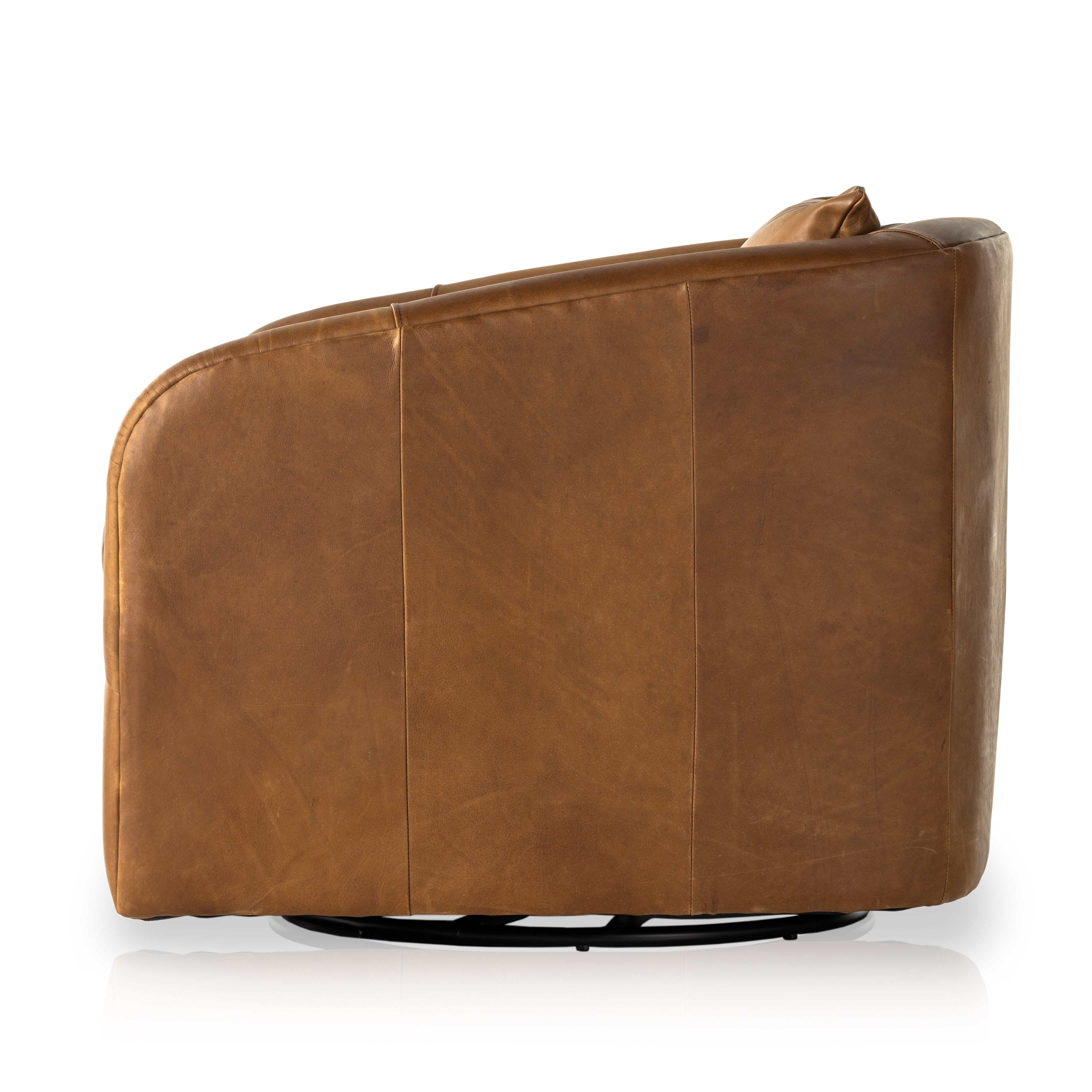 Angled arms and a single pillow create a laid-back look, with a 360-degree swivel for ease in your office or living room. Sourced from one of the oldest family-owned tanneries in Italyâ€™s Bassano del Grappa, our top-grain heirloom leather covering is salvaged and processed from upcycled hides featuring an abundance of natural markings, scars and color variations. Amethyst Home provides interior design, new construction, custom furniture, and area rugs in the Portland metro area.