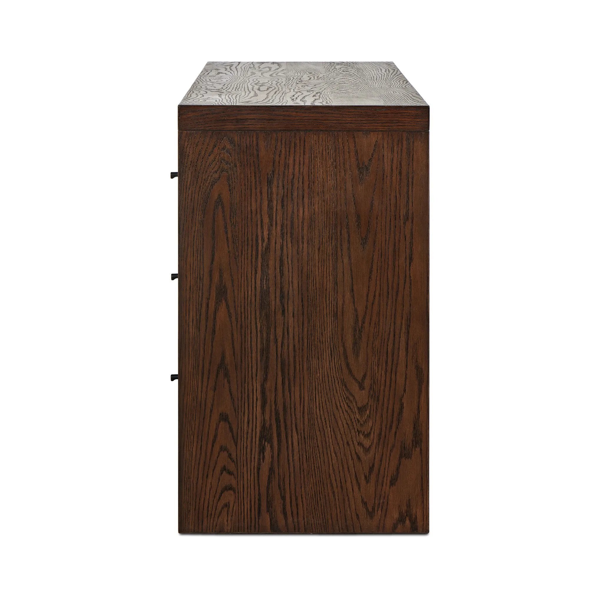 Featuring Torrington Umber Oak 6 Drawer Dresser by Four Hands at Amethyst Home. Straight planks of solid umber oak and veneer encase this spacious dresser for an understated modern look. Deep wood grain adds natural character.
Overall Dimensions: 20.0" L x 75.0 " W x 34.0" H
Collection: HamiltonColors: Umber Oak ,Umber Oak VeneerMaterials: Resawn Oak ,O. Amethyst Home provides interior design, new home construction design consulting, vintage area rugs, and lighting in the Winter Garden metro area.