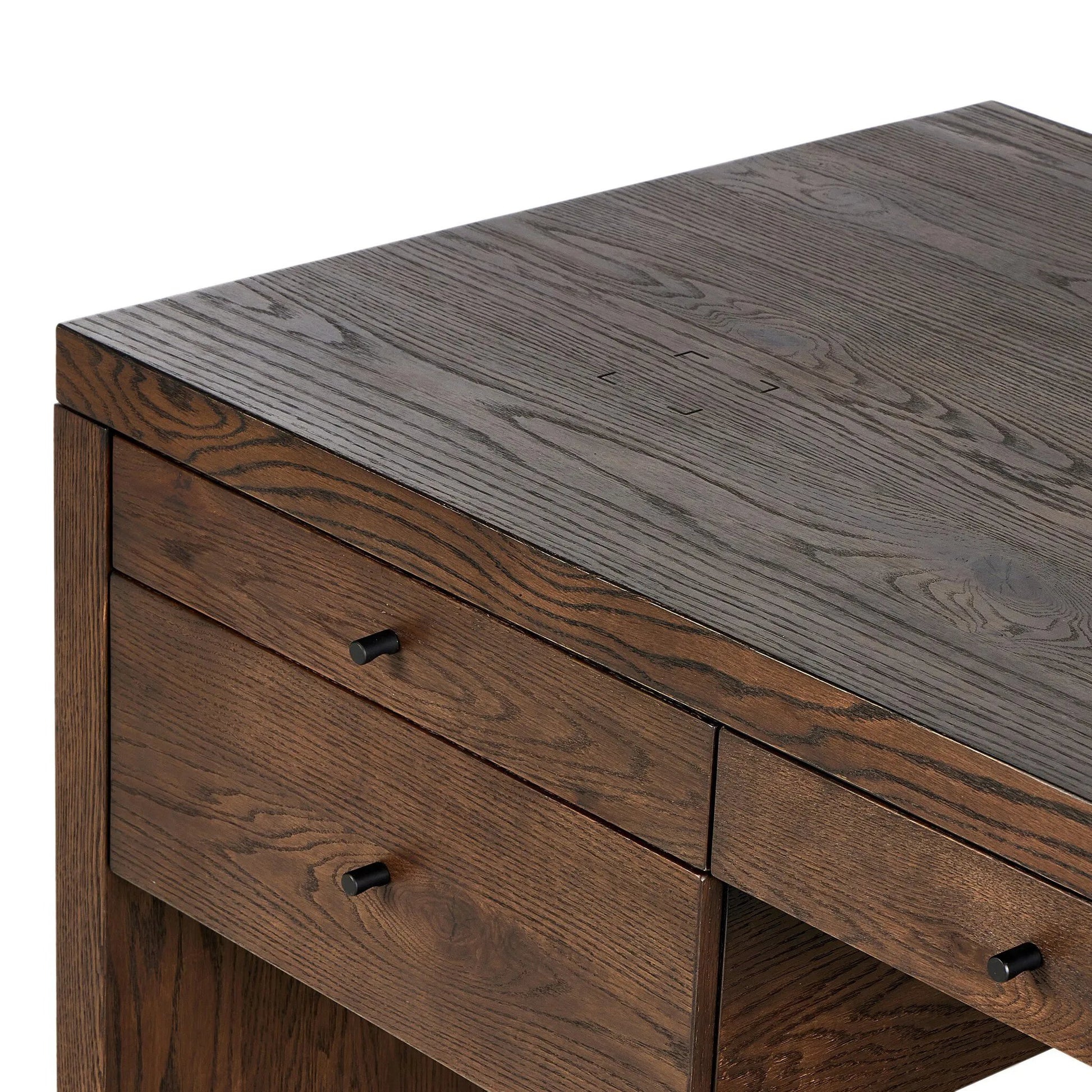An executive-sized desk of rich brown oak offers generous surface and storage space, while a flip top keeps cords out of sight. Invisible wireless charging for Android and Apple products.Collection: Hamilto Amethyst Home provides interior design, new home construction design consulting, vintage area rugs, and lighting in the Calabasas metro area.