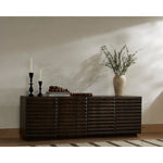 Featuring Tussac Matte Brown Neem Media Console by Four Hands at Amethyst Home. Tussac Matte Brown Neem Media Console is made from dark-finished neem native to India, Africa and other semi-tropical regions, chamfer detailing brings a linear, textured look to a storage-driven media console. Dual rear cutouts for cord management.
Overall Dimensions: 78"W x 17.75"L x 27"HWeight: 155.42 lbsMa. Amethyst Home provides interior design services, furniture, rugs, and lighting in the Los Angeles metro area.