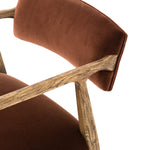 An angular distressed oak frame holds a deep seat and striking, low-slung back. Upholstered in velvety burnt auburn covering of 100% cotton. Amethyst Home provides interior design, new construction, custom furniture, and area rugs in the Charlotte metro area.