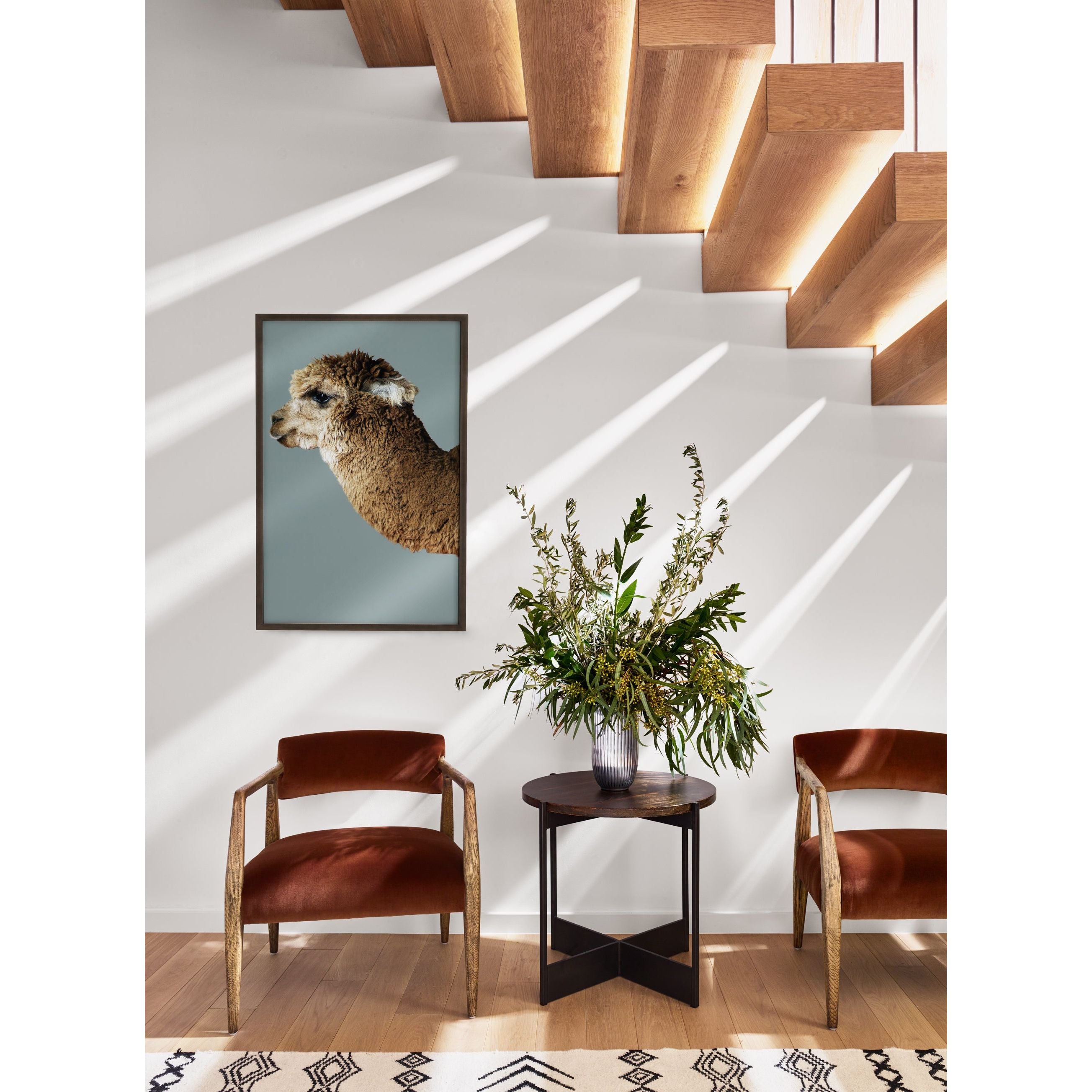 An angular distressed oak frame holds a deep seat and striking, low-slung back. Upholstered in velvety burnt auburn covering of 100% cotton. Amethyst Home provides interior design, new construction, custom furniture, and area rugs in the Newport Beach metro area.