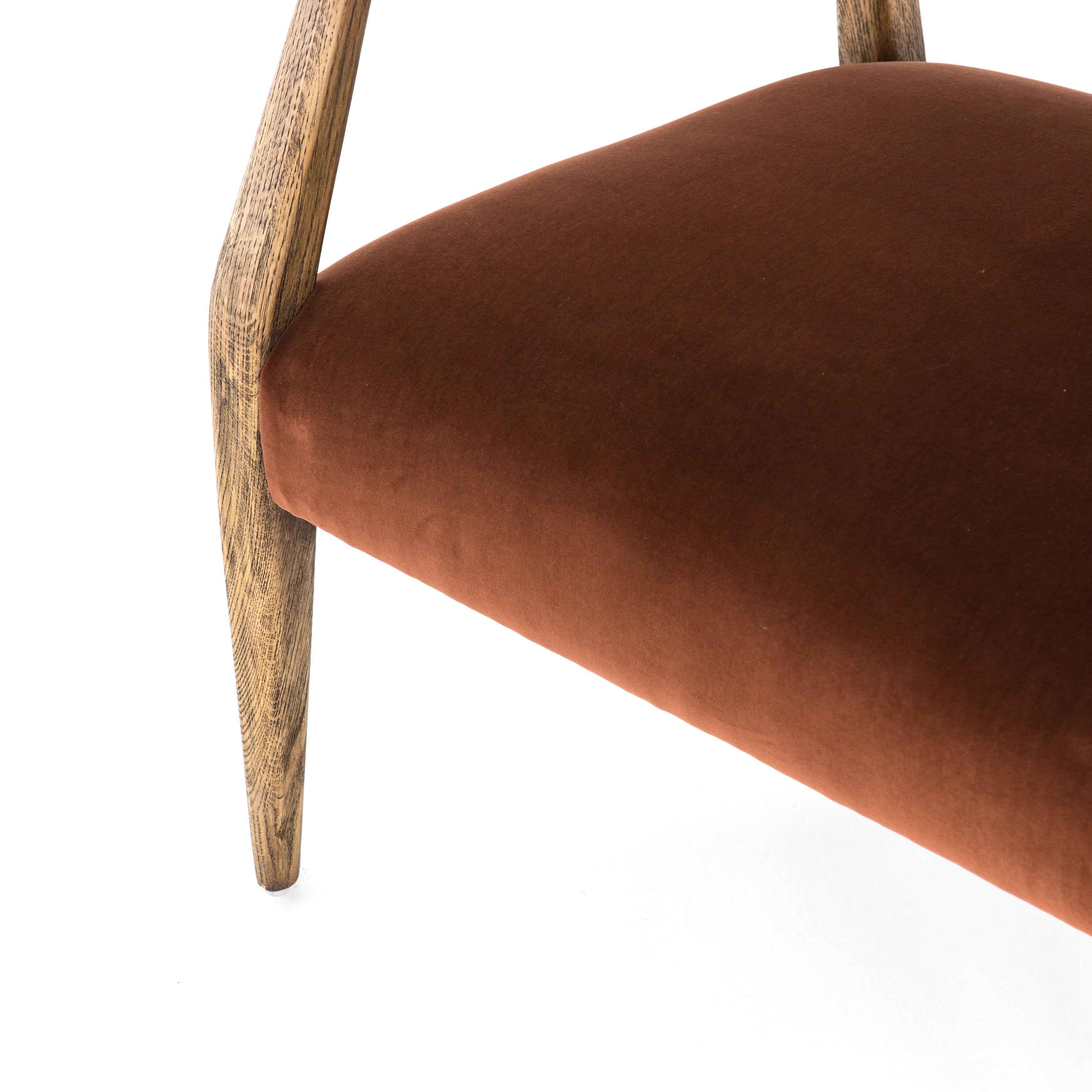 An angular distressed oak frame holds a deep seat and striking, low-slung back. Upholstered in velvety burnt auburn covering of 100% cotton. Amethyst Home provides interior design, new construction, custom furniture, and area rugs in the Scottsdale metro area.