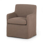 Featuring Westcott Brussels Mushroom Slipcover Dining Chair by Four Hands at Amethyst Home. A classic slipcovered dining chair in an earthy mushroom hue pairs elegance and comfort. With rounded arms and a back height of 35", the chair is taller than the standard size and exudes quiet luxury.Collection: KensingtonColors: Brussels MushroomMaterials: 100% Flax. Amethyst Home provides interior design, new home construction design consulting, vintage area rugs, and lighting in the Calabasas metro area.