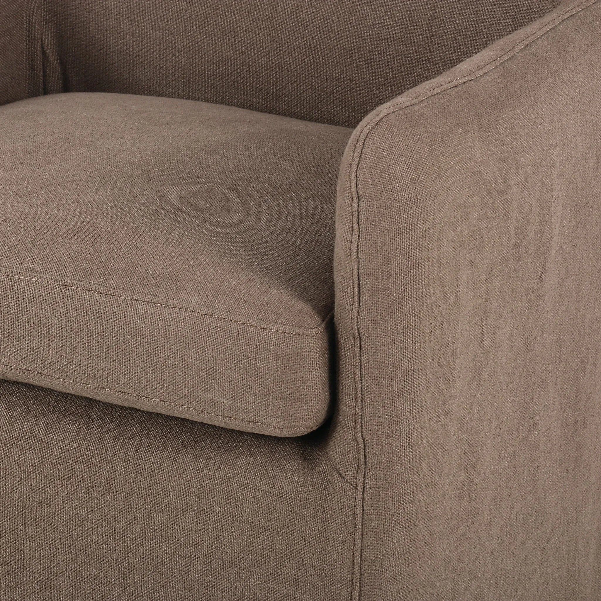 Featuring Westcott Brussels Mushroom Slipcover Dining Chair by Four Hands at Amethyst Home. A classic slipcovered dining chair in an earthy mushroom hue pairs elegance and comfort. With rounded arms and a back height of 35", the chair is taller than the standard size and exudes quiet luxury.Collection: KensingtonColors: Brussels MushroomMaterials: 100% Fla. Amethyst Home provides interior design, new home construction design consulting, vintage area rugs, and lighting in the Des Moines metro area.