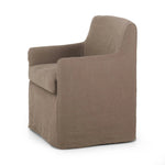 Featuring Westcott Brussels Mushroom Slipcover Dining Chair by Four Hands at Amethyst Home. A classic slipcovered dining chair in an earthy mushroom hue pairs elegance and comfort. With rounded arms and a back height of 35", the chair is taller than the standard size and exudes quiet luxury.Collection: KensingtonColors: Brussels MushroomMaterials: 100% Flax/Lin. Amethyst Home provides interior design, new home construction design consulting, vintage area rugs, and lighting in the Omaha metro area.