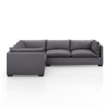 Featuring Westwood Bennett Charcoal 3-PC Sectional by Four Hands at Amethyst Home. Westwood Bennett Charcoal 3-PC Sectional's clean-lined and simply styled, high-performance fabric places a family-friendly twist on the quintessential sectional. A wooden base keeps things classy while casual. Various configuration options offer flexibility in any size space. Performance fabrics are specially cre. Amethyst Home provides interior design services, furniture, rugs, and lighting in the Omaha metro area.