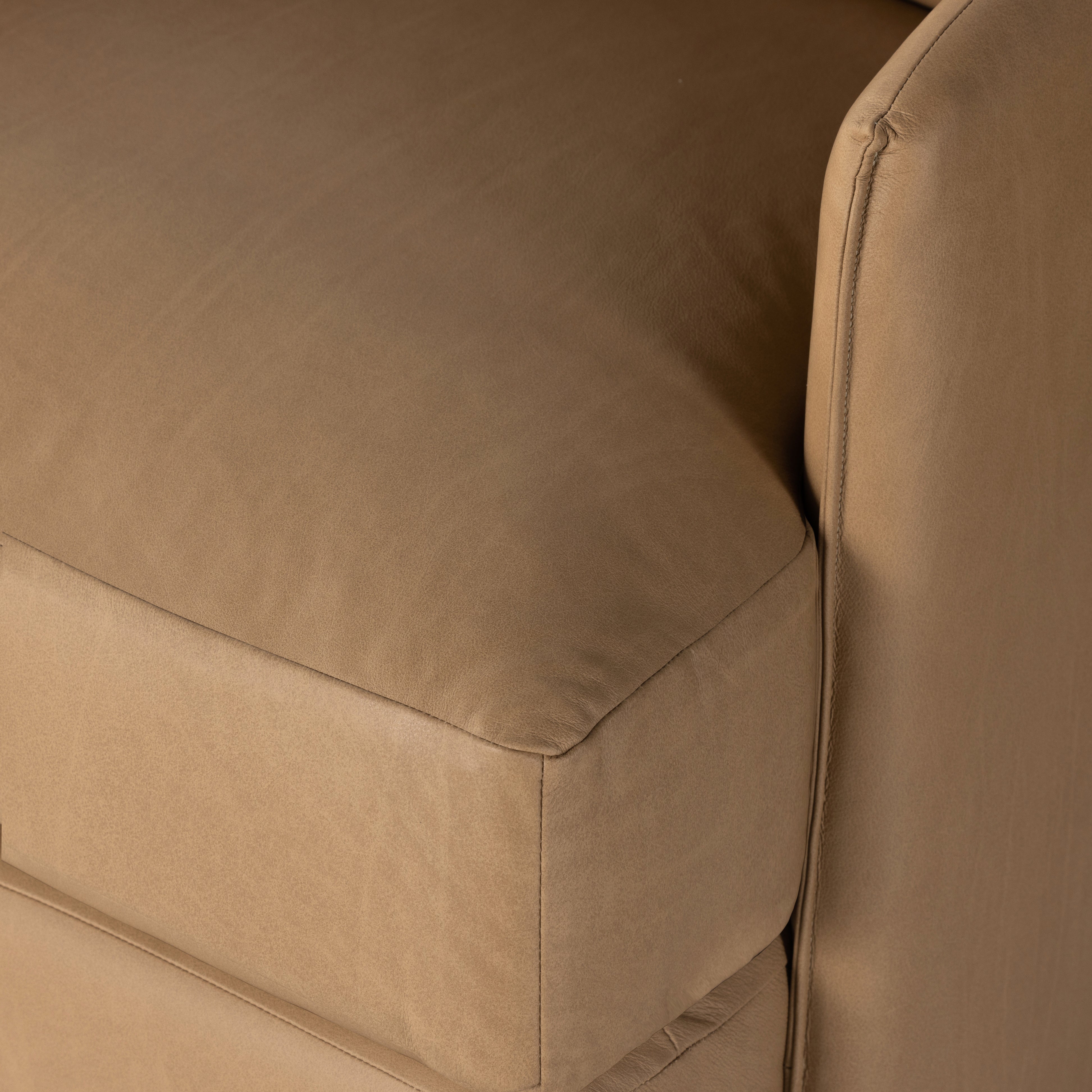 Featuring Whittaker Nantucket Taupe Swivel Chair by Four Hands at Amethyst Home. Atop a 360-degree swivel sits ultra-cushioned seating upholstered in scratch- and water-resistant high-performance leather that's luxurious and sensible. Performance fabrics are specially created to withstand spills, stains, high traffic and wear, ensuring long-term comfort and unmatched durability.. Amethyst Home provides interior design, new construction, custom furniture, and area rugs in the Alpharetta metro area.