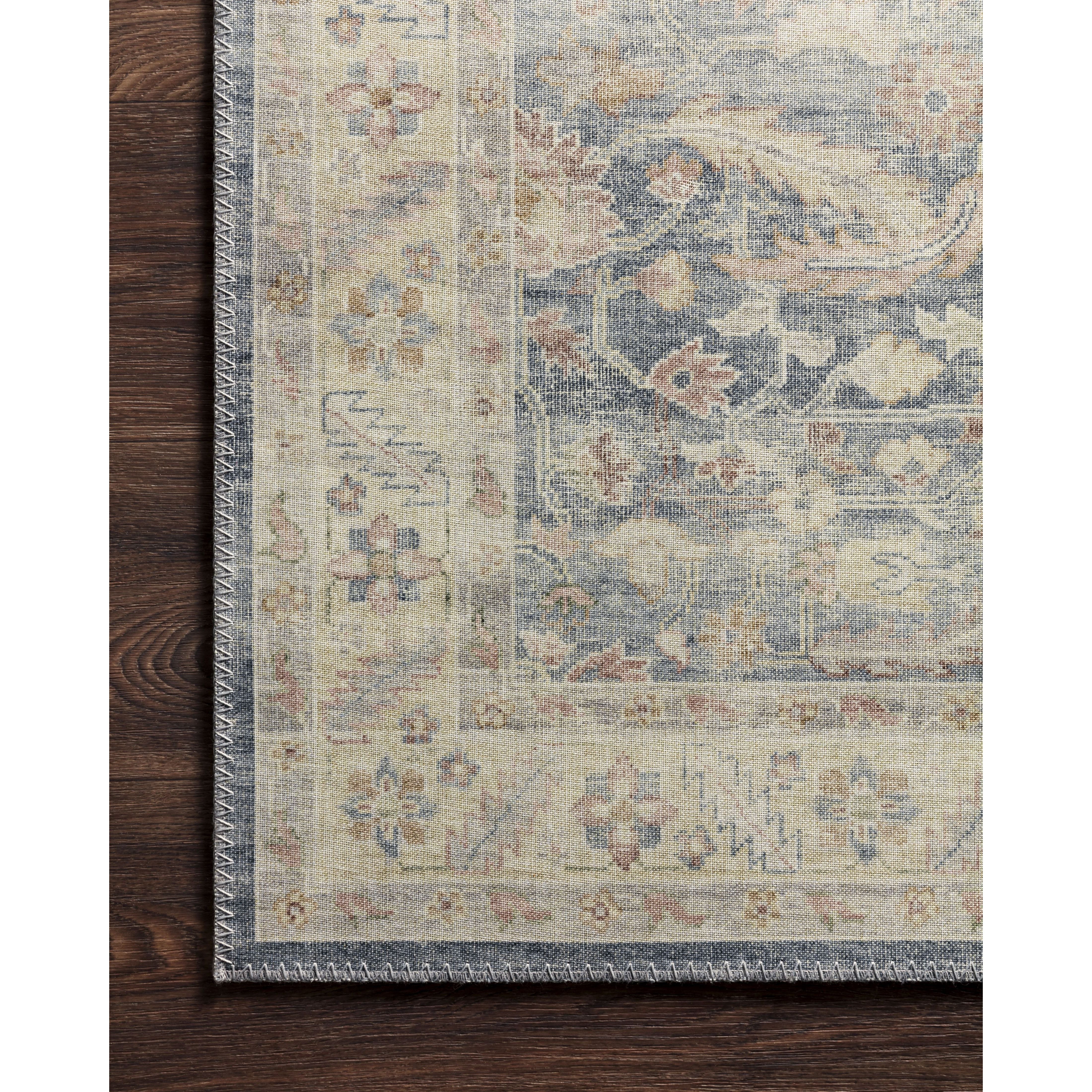 Featuring Hathaway Denim/Multi Rug by Loloi at Amethyst Home. Featuring soft motifs in a carefully curated color palate of blue, yellow, red, and hints of orange, the Hathaway Denim / Multi area rug captures the essence of one-of-a-kind vintage or antique area rug at an attractive price.
This rug is ideal for high traffic areas due to the rug's power-loom.  Amethyst Home provides interior design, new home construction design consulting, vintage area rugs, and lighting in the Washington metro area.