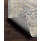 Featuring Hathaway Denim/Multi Rug by Loloi at Amethyst Home. Featuring soft motifs in a carefully curated color palate of blue, yellow, red, and hints of orange, the Hathaway Denim / Multi area rug captures the essence of one-of-a-kind vintage or antique area rug at an attractive price.
This rug is ideal for high traffic areas due to the rug's power-loome.  Amethyst Home provides interior design, new home construction design consulting, vintage area rugs, and lighting in the Charlotte metro area.