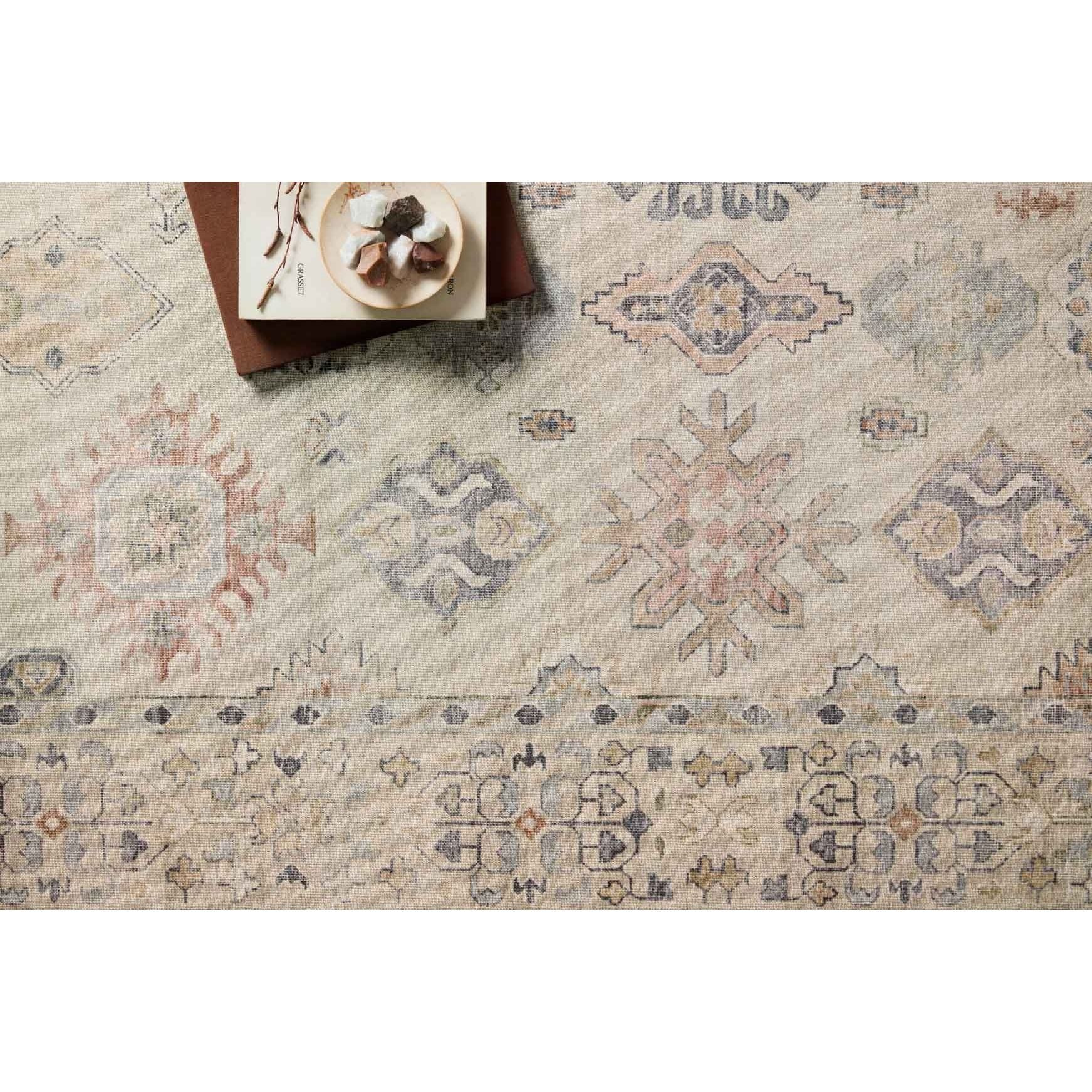 Featuring Hathaway Beige/Multi Rug by Loloi at Amethyst Home. Featuring soft motifs in a carefully curated color palate of beige, ivory, and hints of black, the Hathaway Beige / Multi area rug captures the essence of one-of-a-kind vintage or antique area rug at an attractive price.
This rug is ideal for high traffic areas due to the rug's power-loomed d.  Amethyst Home provides interior design, new home construction design consulting, vintage area rugs, and lighting in the Laguna Beach metro area.