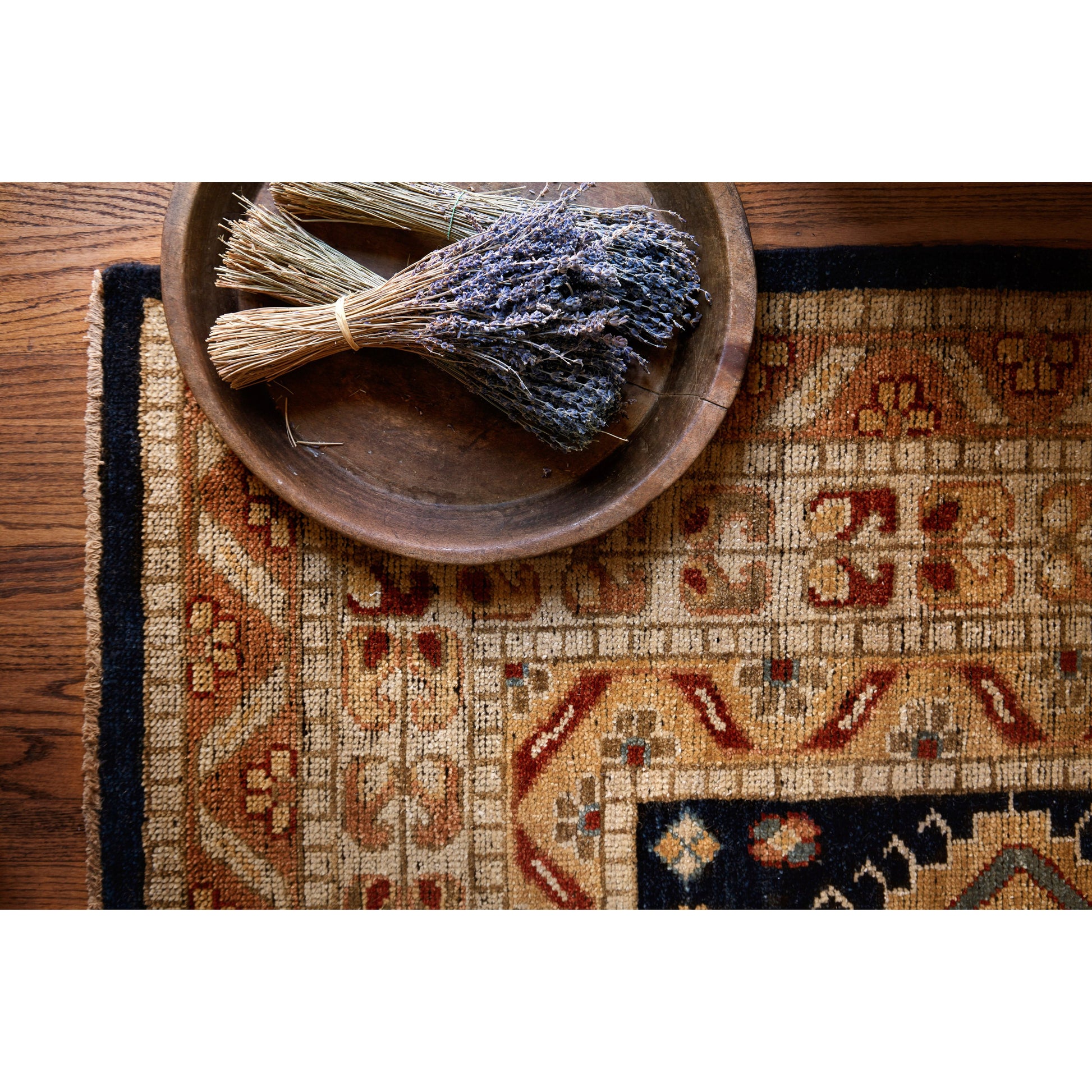Heirloom Navy / Multi Rug - Amethyst Home Bring a touch of antiqued beauty into your home with our Heirloom collection. This 100% wool collection tastefully honors the art of hand knotted rugs from India. Heirloom evokes a sense of unique sophistication with its traditional Serapi rug color palettes and vintage design.