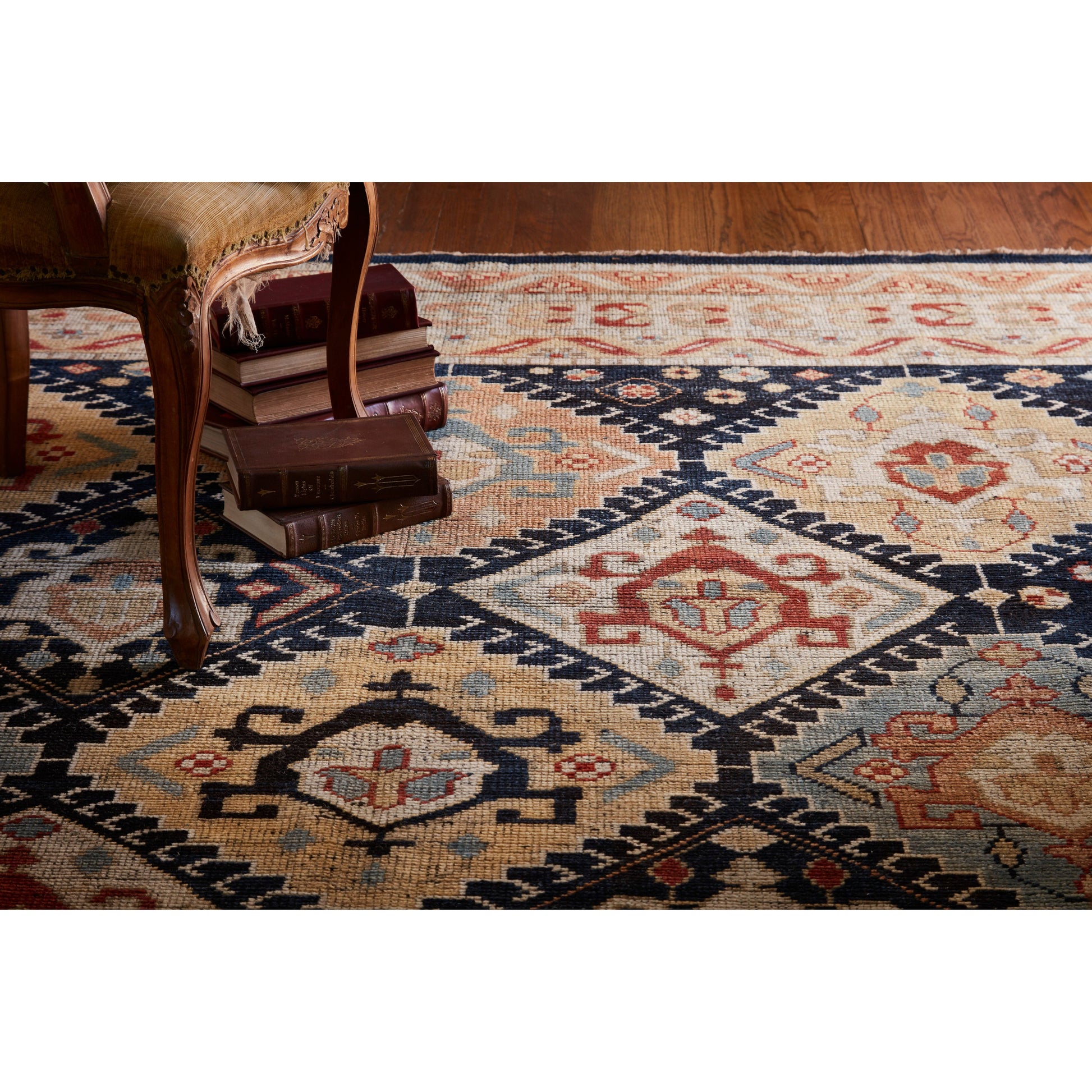 Heirloom Navy / Multi Rug - Amethyst Home Bring a touch of antiqued beauty into your home with our Heirloom collection. This 100% wool collection tastefully honors the art of hand knotted rugs from India. Heirloom evokes a sense of unique sophistication with its traditional Serapi rug color palettes and vintage design.