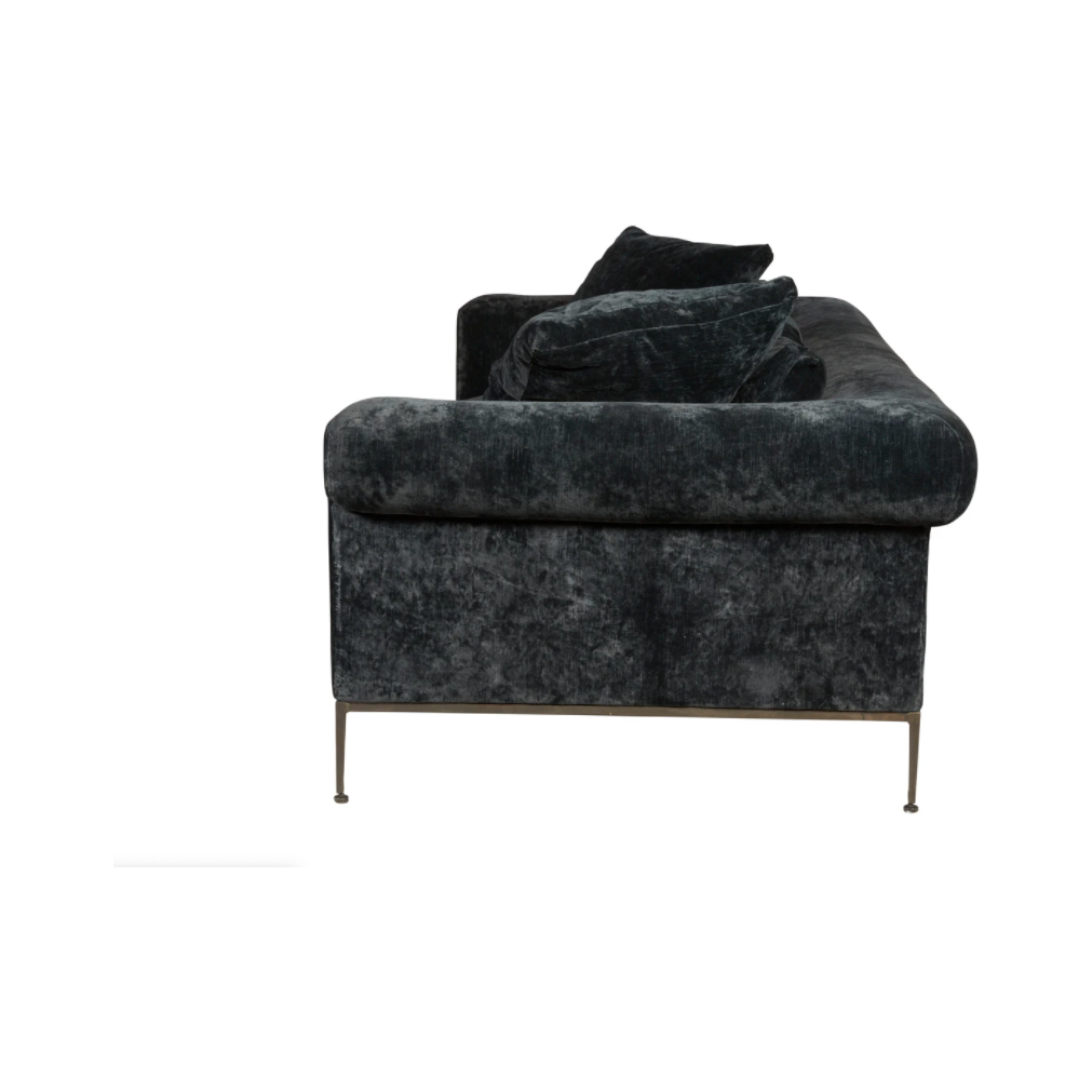 The Henrietta Upholstered Sofa Family by Cisco Brothers is the perfect centerpiece to your living room style. This dapper sofa has a distinctive style, with elegant roll arms and metal black-rust legs. Update your space with this mid-century influenced piece.