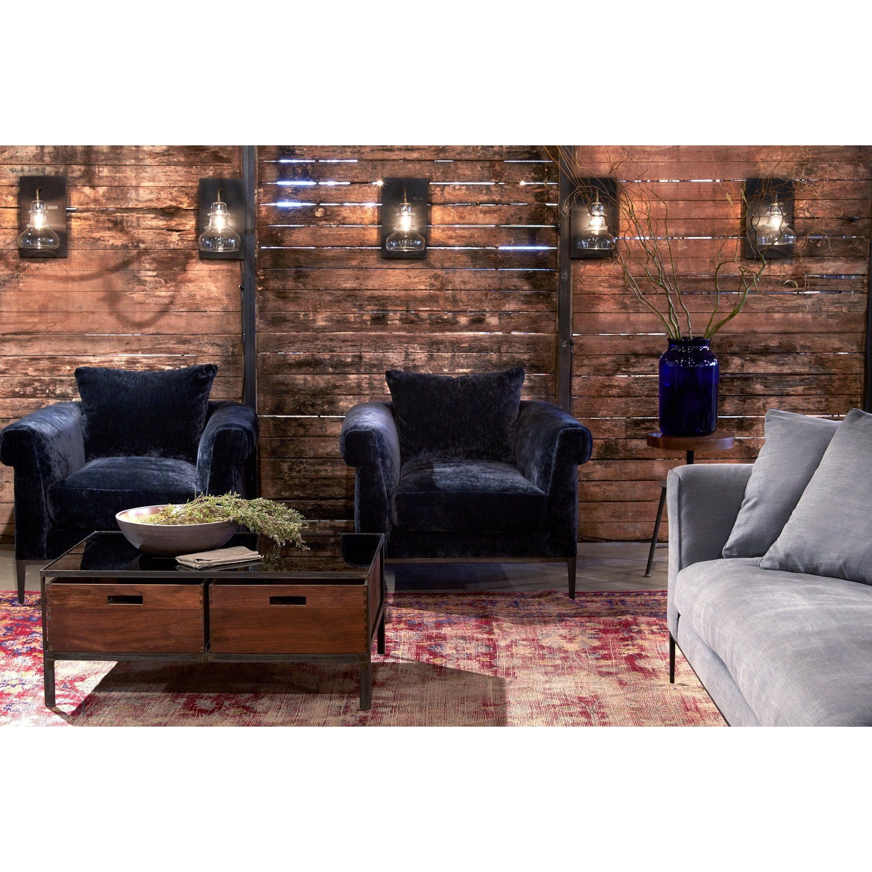Featuring Henrietta Upholstered Chair by Cisco Brothers at Amethyst Home. The Henrietta Chair by Cisco Brothers is the ideal mid-century accent to your living room style. This dashing piece boasts a distinctive style, with elegant roll arms and metal black-rust legs. This chair is a fresh look on a classic style, updating the familiar silhouette with a uni.  Amethyst Home provides interior design, new home construction design consulting, vintage area rugs, and lighting in the San Diego metro area.