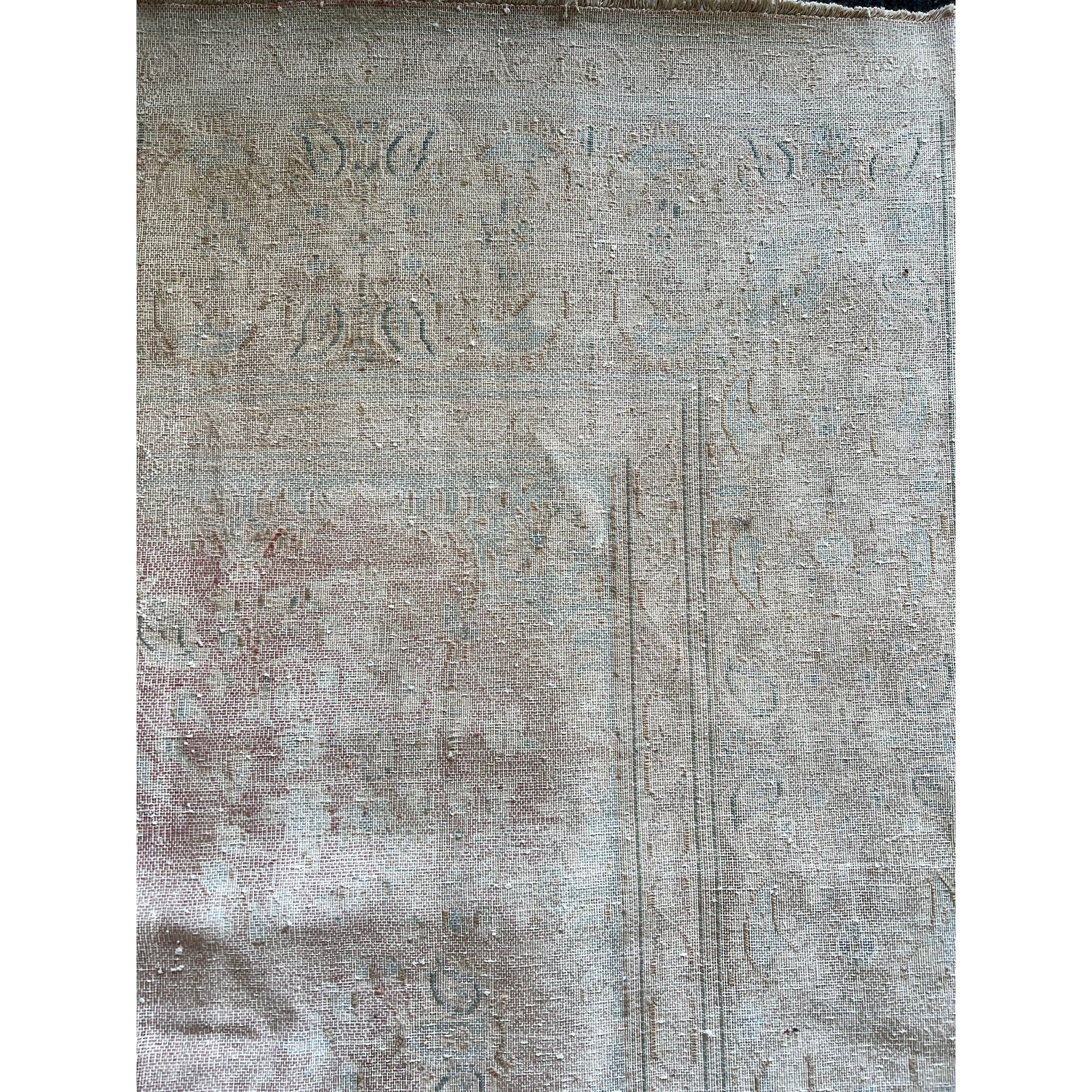 Whitewashed pastels hues on one side, flip for intense pinks and blues!  Hand knotted, 100% wool - perfect for high traffic areas.
