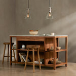 Featuring Indira Smoked Acacia Kitchen Island by Four Hands at Amethyst Home. Create space and style with the Indira Kitchen Island in Smoked Acacia made from smoked acacia and solid white marble. Roomy open shelving offers ample options for storage and display, while dual drawers keep frequently used items within reach.
Size: 62"W x 29"L x 36"H
Colors: Smoked Acacia, Smoked Acacia Veneer, Whit. Amethyst Home provides interior design services, furniture, rugs, and lighting in the Omaha metro area.
