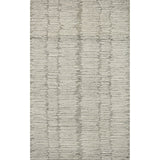 Hand-crafted with a combination of thick and fine yarns, the Tallulah Stone / Ivory Rug area rug creates dynamic dimension in living rooms, bedrooms, and more. The thicker yarns define the abstract, linear design, giving the rug a distinct high-low texture and sense of movement. Tallulah's soft, neutral palettes have a depth of tone inspired by watercolor pigmentation. Amethyst Home provides interior design, new construction, custom furniture, and area rugs in the Miami metro area.