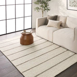 Featuring Bavell Almeda Rug by Jaipur Living at Amethyst Home. With its mesmerizing waves of 100% premium undyed artisanal wool, Norfolk adds an earthy, elemental ease to any modern interior. In unique combinations of creams and browns, the weaver’s impromptu selection of undyed yarn results in unexpected flecks of gray. Enjoy effortless style, and unsurpassed. Amethyst Home provides interior design, new home construction design consulting, vintage area rugs, and lighting in the Dallas metro area.