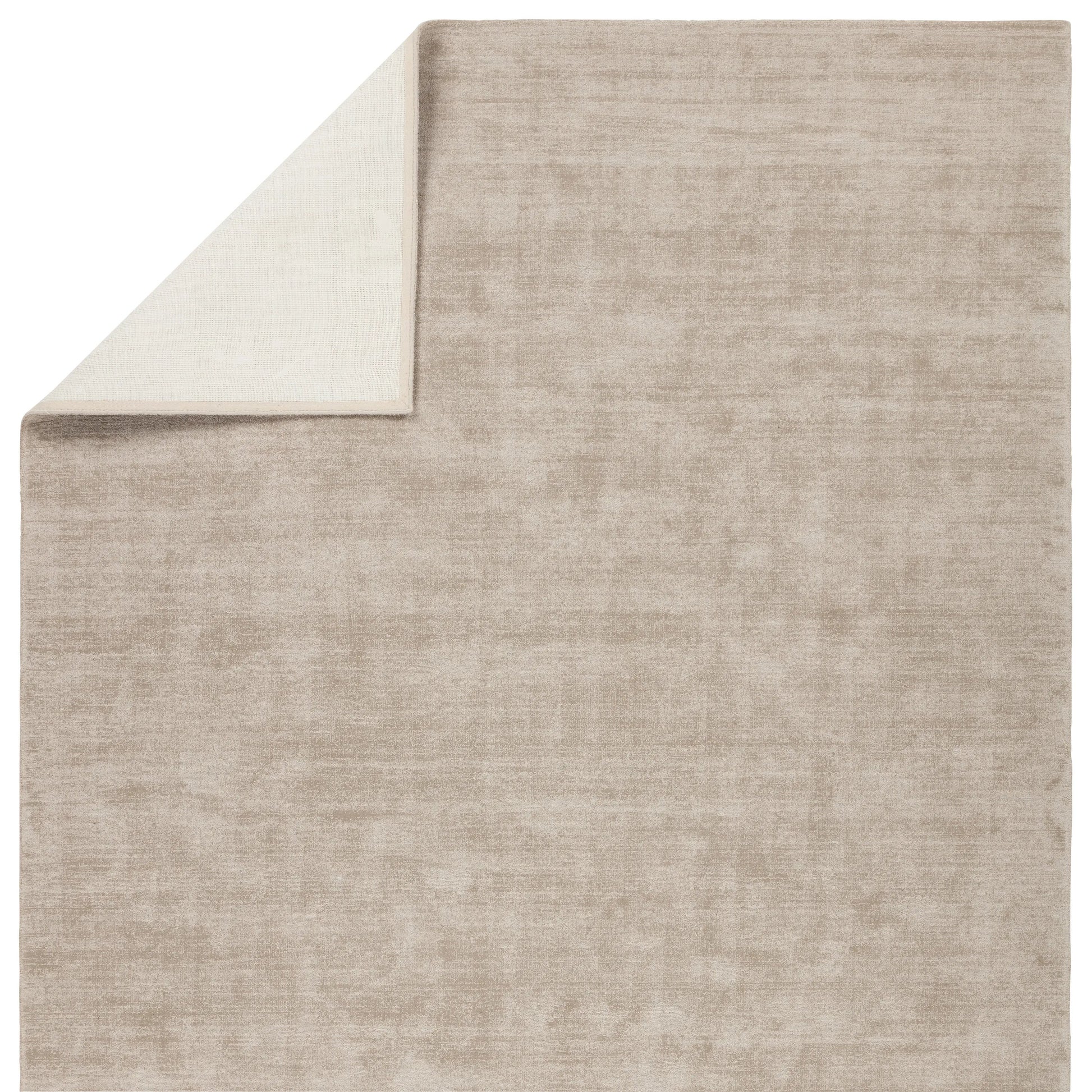 The Fletcher collection combines effortless luxury with impressive durability. This handwoven assortment features lustrous, solid designs crafted of 100% PET yarn. The Arcus rug provides a taupe and cream colorway, cut and loop pile, and a subtle luster. Amethyst Home provides interior design, new home construction design consulting, vintage area rugs, and lighting in the Scottsdale metro area.