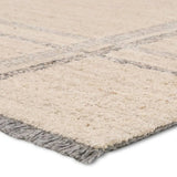 Featuring Hadi Bilal Rug by Jaipur Living at Amethyst Home. The hand-tufted Hadi Bilal introduces fresh looks inspired by modern Moroccan patterns and neutral colorways. The Bilal design features a trellis with geometric detailing, encompassing North African styles in cream and gray hues. Short, gray fringe and 100% wool pile adds to the global appeal. Thi. Amethyst Home provides interior design, new home construction design consulting, vintage area rugs, and lighting in the Alpharetta metro area.