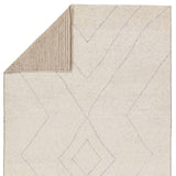Rich in detail and plush underfoot, the Indira Laverna is made up of neutral-toned modern Moroccan styles. The Laverna area rug features a slight sheen and luxurious hand-knotted construction of natural wool and viscose. A light trellis design provides geometric interest in a silver-blue hue on a soft ivory backdrop. Amethyst Home provides interior design, new home construction design consulting, vintage area rugs, and lighting in the Portland metro area.