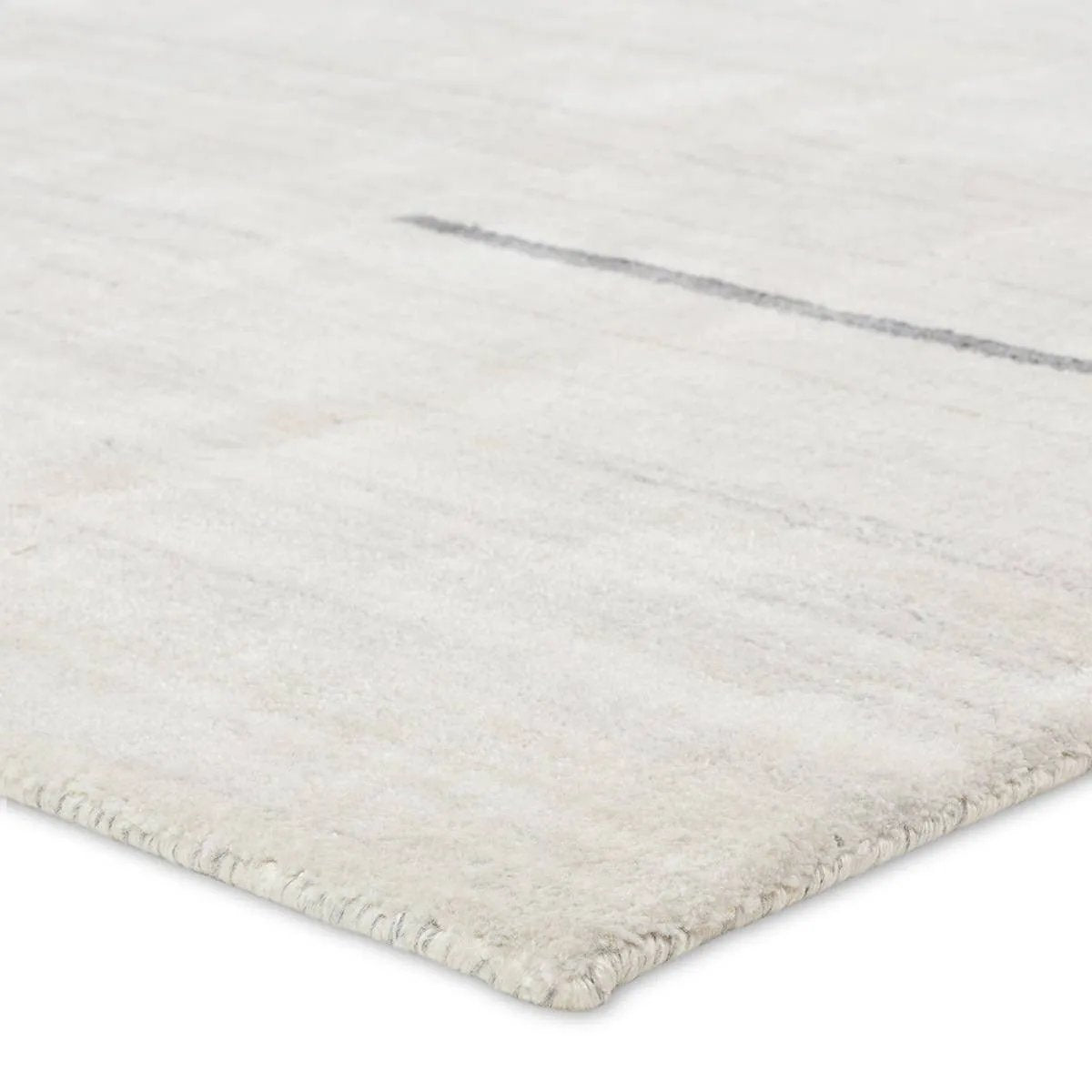 The indoor and outdoor Ivar Tinsin features artfully handwoven rugs that emulate a handknot look. These performance pieces are water, stain, and fade resistant, perfect for an accent piece that can withstand high traffic areas, children, and pets. The Tinsin design showcases a subtle stripe design in hues gray and ivory. Amethyst Home provides interior design, new home construction design consulting, vintage area rugs, and lighting in the Alpharetta metro area.