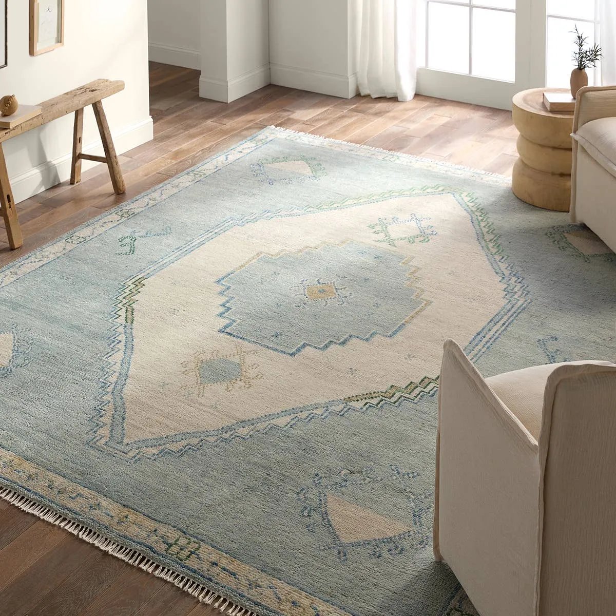 The hand-knotted Jinsen collection features a fresh incarnation of the vintage Turkish textile look. Classic in pattern and modern in color, the Alamo rug boasts a beautiful palette of cream, beige, gold, and brown, featuring distinct dye-lot details and subtle fringe. Amethyst Home provides interior design, new home construction design consulting, vintage area rugs, and lighting in the Miami metro area.