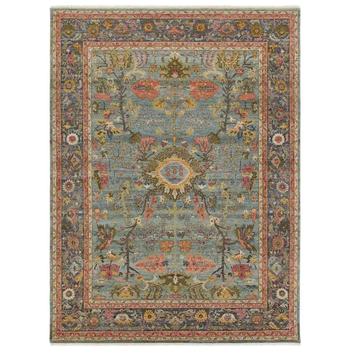 A bold colorway, high knot-count, and intricate designs define the handcrafted Novalie collection. The Elwood design features a medallion with sprawling florals and an intricate border. The blue, pink, green, gold, and gray colors provide visual intrigue and an updated traditional style. Amethyst Home provides interior design, new home construction design consulting, vintage area rugs, and lighting in the Tampa metro area.