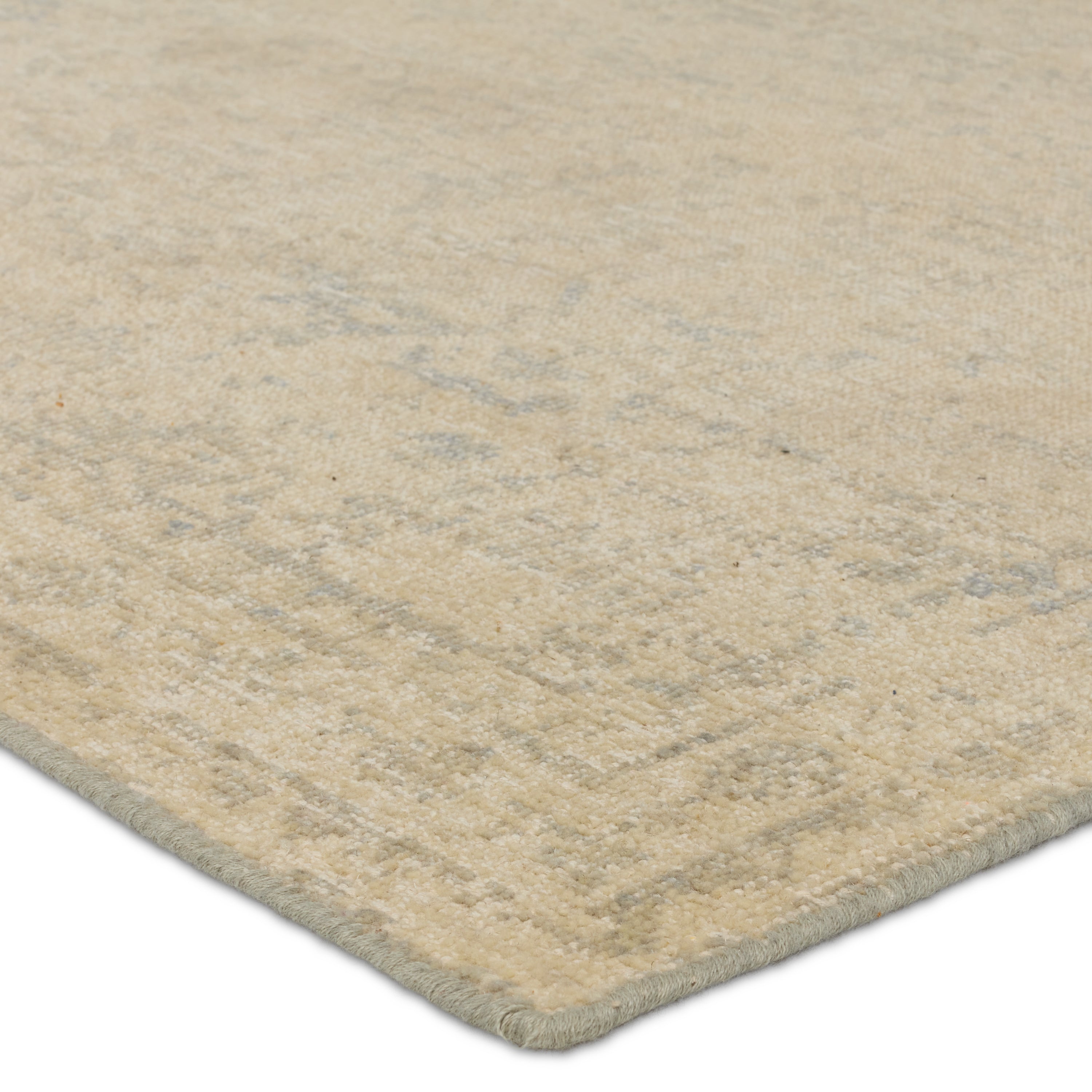 The Onessa collection marries traditional motifs with soft, subdued colorways for the perfect blend of fresh and time-honored style. These hand-knotted wool rugs feature a hand-sheared quality that lends the design a coveted vintage impression. The Nell rug features a heavily distressed, floral pattern in hues of tan, muted slate, and cream. Amethyst Home provides interior design, new construction, custom furniture, and area rugs in the Washington metro area.