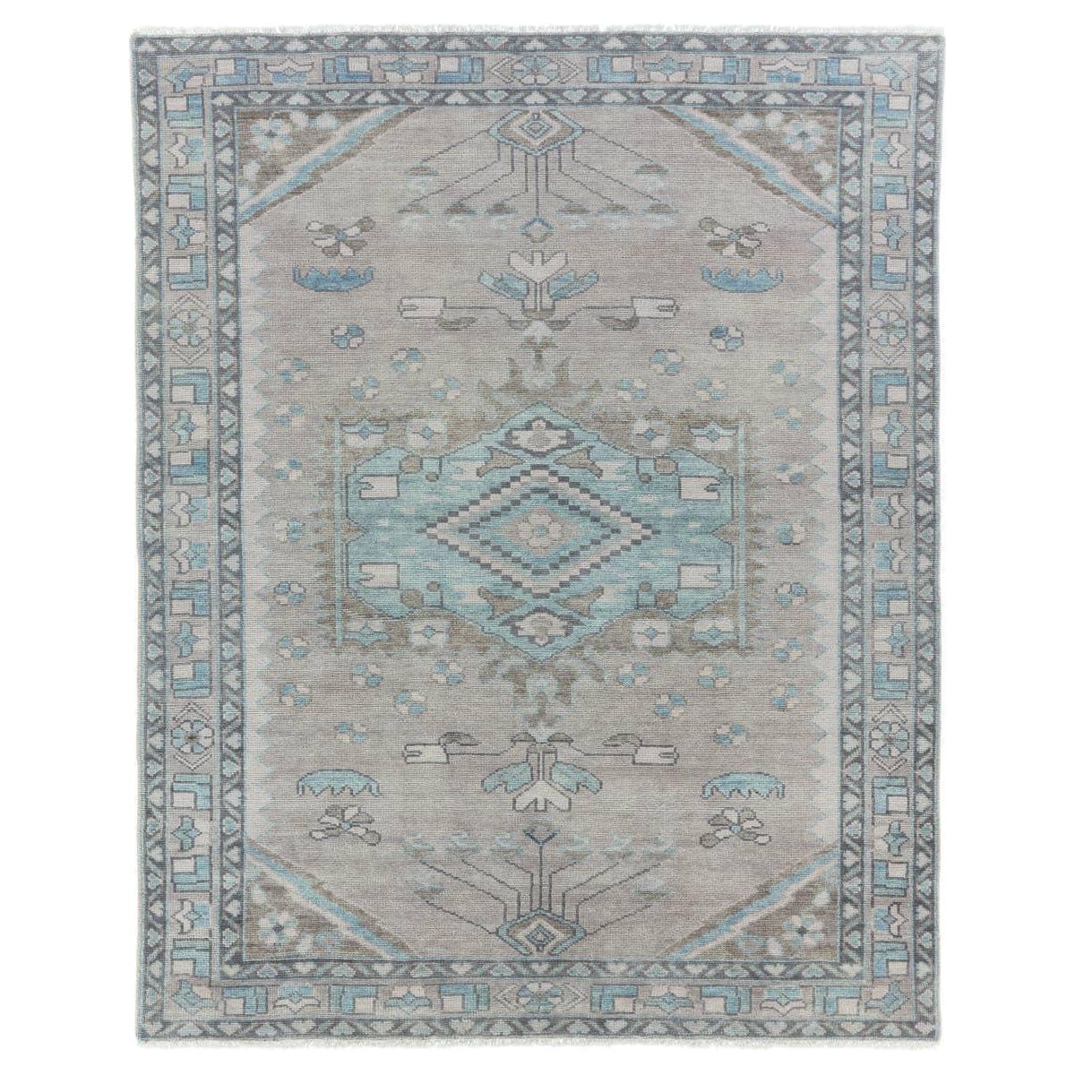 The Salinas Santita is punctuated by both vibrant and neutral hues and combined with intricate details, lending a stunning transitional look to any home. The Santita rug makes a moody statement with grounding hues and a tribal, medallion motifs. This durable, artisan-made rug features geometric accents in a serene gray, blue, and taupe colorway. Amethyst Home provides interior design, new home construction design consulting, vintage area rugs, and lighting in the Newport Beach metro area.