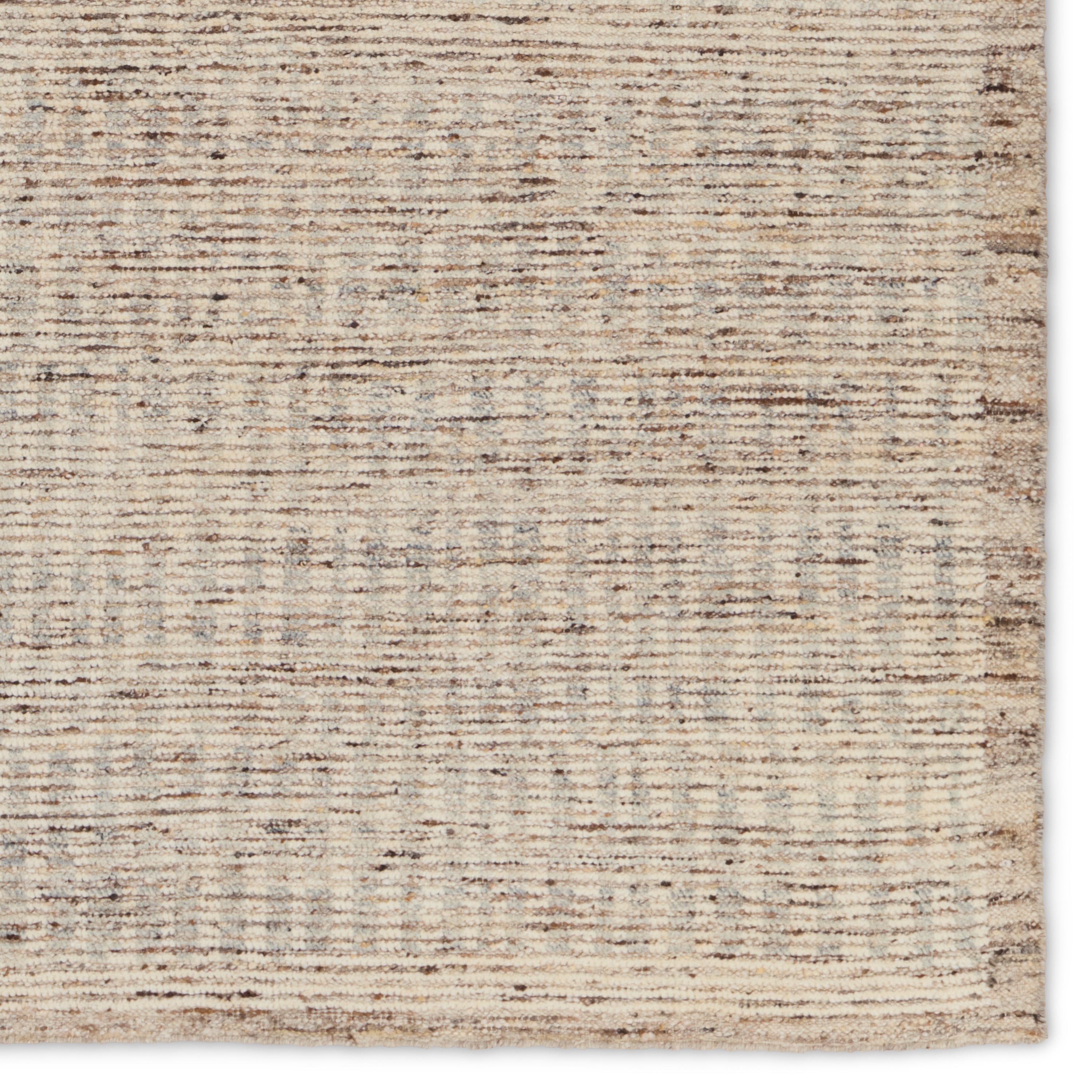 Subtle linear textures and natural colorways define the irresistible quality of the Seora collection. The Camino area rug features a series of perpendicular, striped lines for an intriguing dose of modern appeal. The textural, wool pile contains no dye, reflecting the natural colors of the sheep, for a rich and grounding palette of tan, cream, and flecks of brown and gray.  Amethyst Home provides interior design, new construction, custom furniture, and area rugs in the Des Moines metro area.