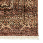 Whimsical colorways combine with the opulent detail of a traditional-inspired pattern - the Someplace in Time Lovas represents nostalgia and progression, heritage and the contemporary. The Lovas rug features a mini-medallion pattern and deep brown and cream colorway that grounds spaces with luxe appeal and an exceptional hand-knotted quality. Amethyst Home provides interior design, new home construction design consulting, vintage area rugs, and lighting in the Washington metro area.