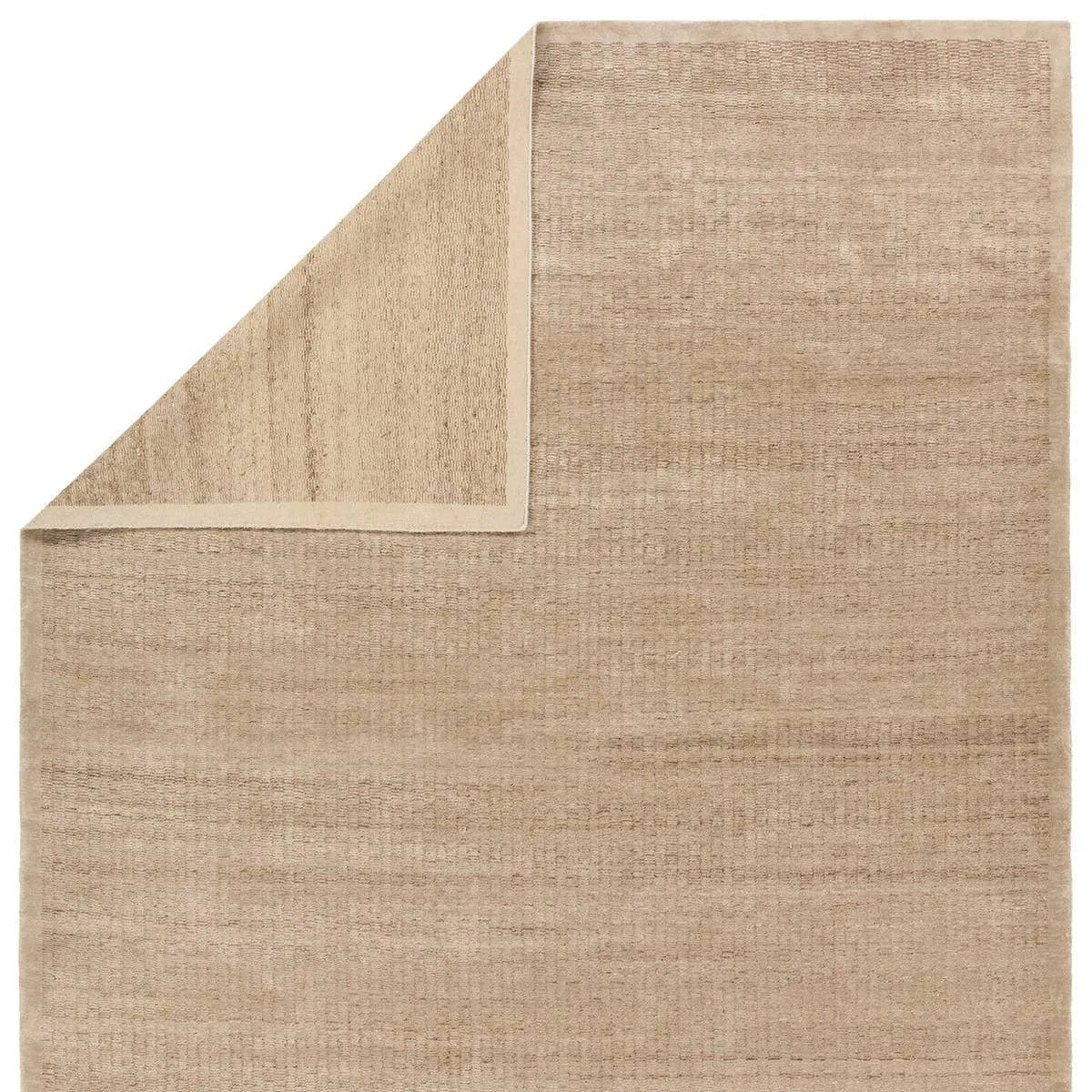 Featuring Theoros Panacea Hand-Knotted Rug by Jaipur Living at Amethyst Home. Discover the unique charm of the Theoros Panacea, where the interplay of silk and nettle creates a truly distinctive addition to any room. Both fibers offer unique qualities, and a blend of these materials provides a balance that appeals to those seeking a rug with a mix of l. Amethyst Home provides interior design, new home construction design consulting, vintage area rugs, and lighting in the Salt Lake City metro area.