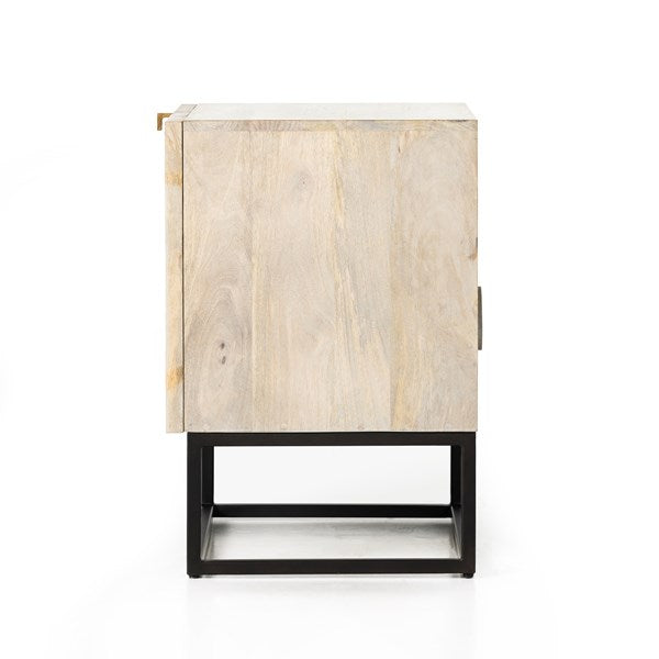 The Kelby Cabinet Nightstand adds a natural, modern feel to any space. A simple minimalist look without sacrificing storage for all your bedside needs. We love the clean lines of this piece with the intentional detailing on the front panel. Amethyst Home provides interior design services, furniture, rugs, and lighting in the Alpharetta metro area.