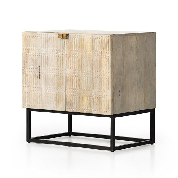 The Kelby Cabinet Nightstand adds a natural, modern feel to any space. A simple minimalist look without sacrificing storage for all your bedside needs. We love the clean lines of this piece with the intentional detailing on the front panel. Amethyst Home provides interior design services, furniture, rugs, and lighting in the Des Moines metro area.