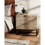 The Kelby Cabinet Nightstand adds a natural, modern feel to any space. A simple minimalist look without sacrificing storage for all your bedside needs. We love the clean lines of this piece with the intentional detailing on the front panel. Amethyst Home provides interior design services, furniture, rugs, and lighting in the Monterey metro area.