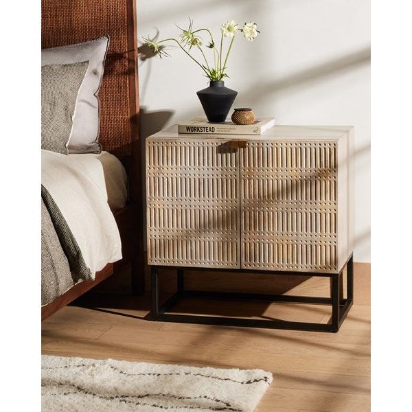 The Kelby Cabinet Nightstand adds a natural, modern feel to any space. A simple minimalist look without sacrificing storage for all your bedside needs. We love the clean lines of this piece with the intentional detailing on the front panel. Amethyst Home provides interior design services, furniture, rugs, and lighting in the Monterey metro area.