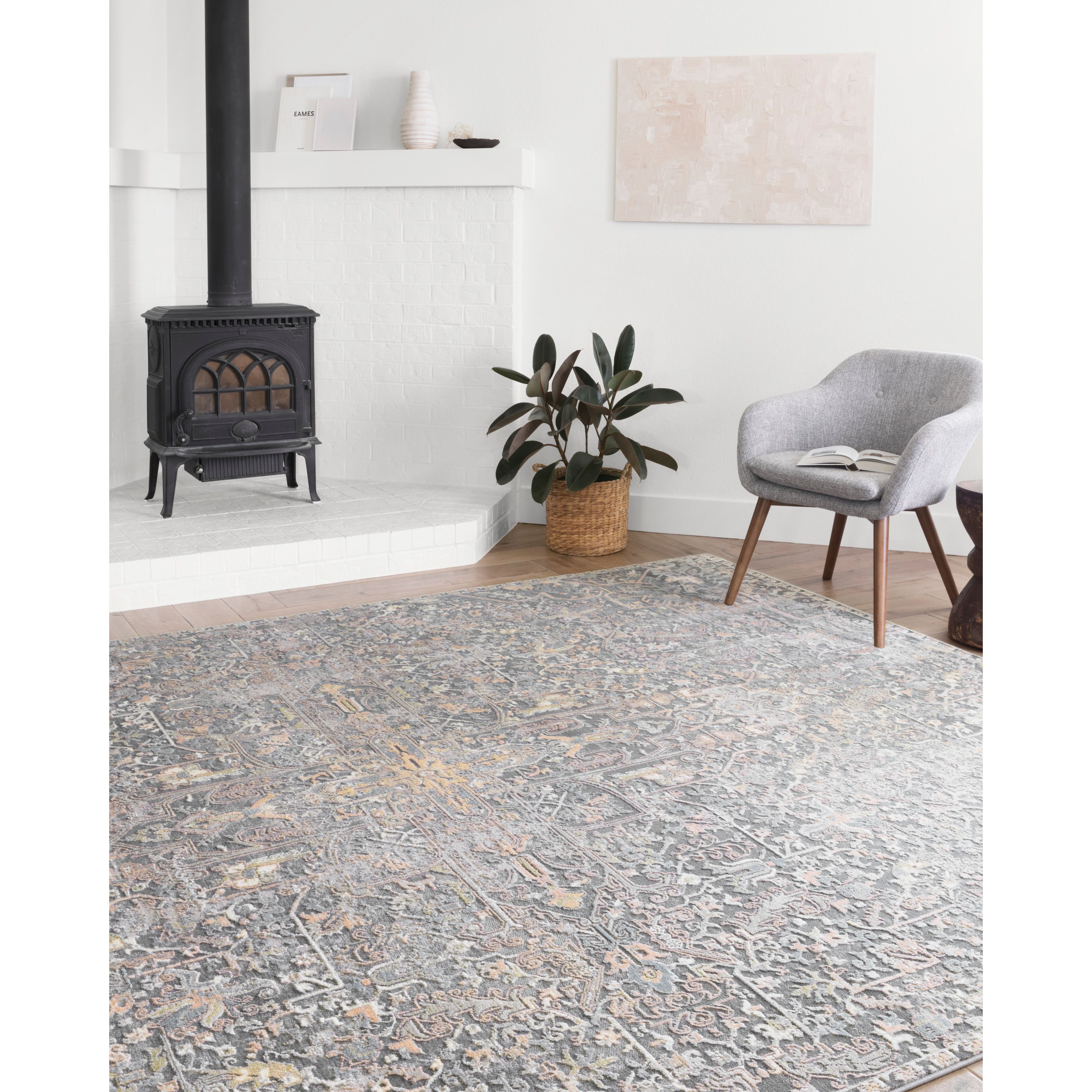 Lucia Charcoal/Multi Rug - Amethyst Home The Lucia Collection is a beautifully rich statement piece to add a layer of sophistication to any room. Power-loomed of polypropylene & polyester with a high/low pile and a curated color palette for a high-end look at an affordable price.