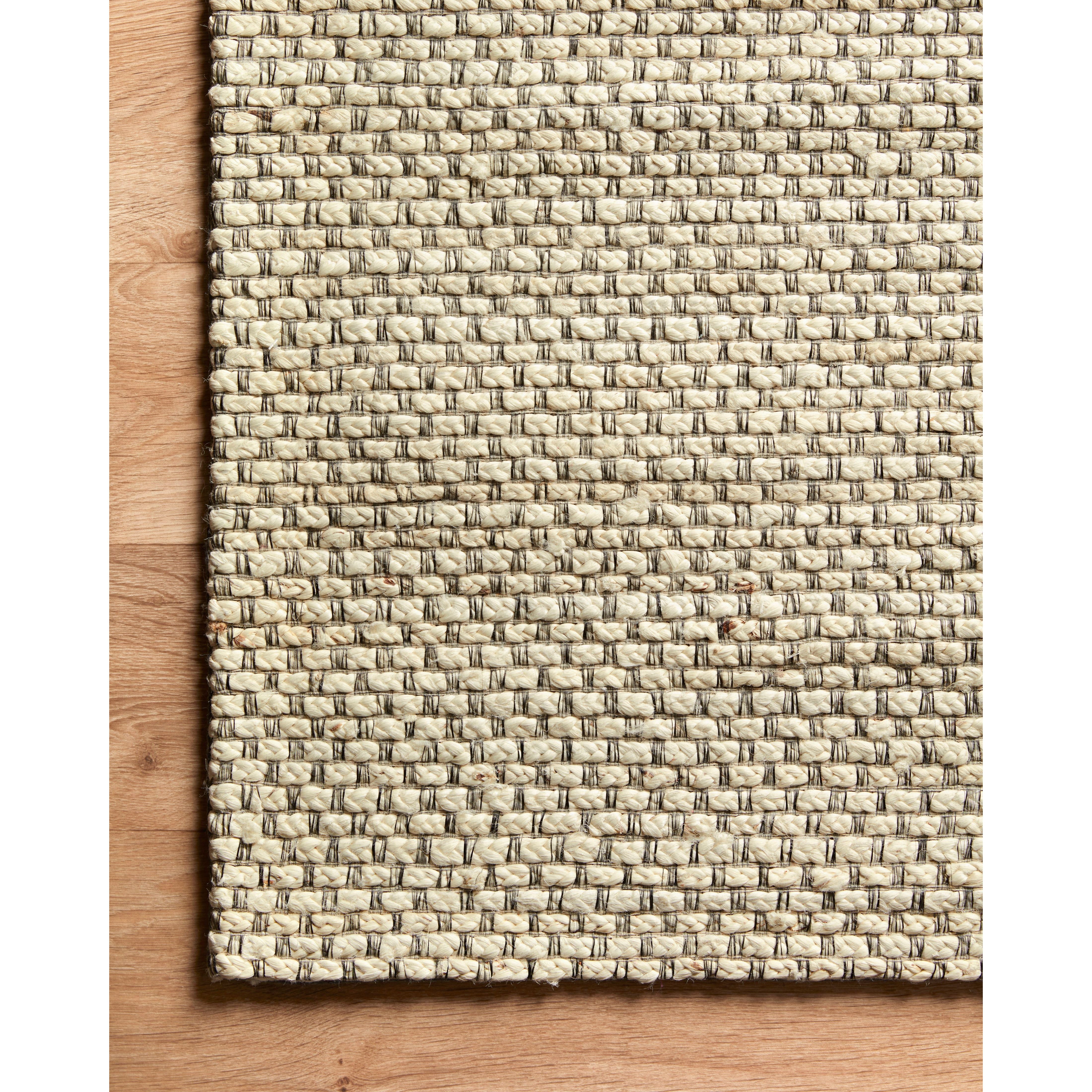 The Loloi Lily Ivory Area Rug, or LIL-01 Ivory, is an earthy base that isn't your average jute area rug. The hand-woven collection has an intricate yet subtle textural look that adds an elevated layer to any style. This area rug would be great for living rooms, dining rooms, or other high-traffic areas. 