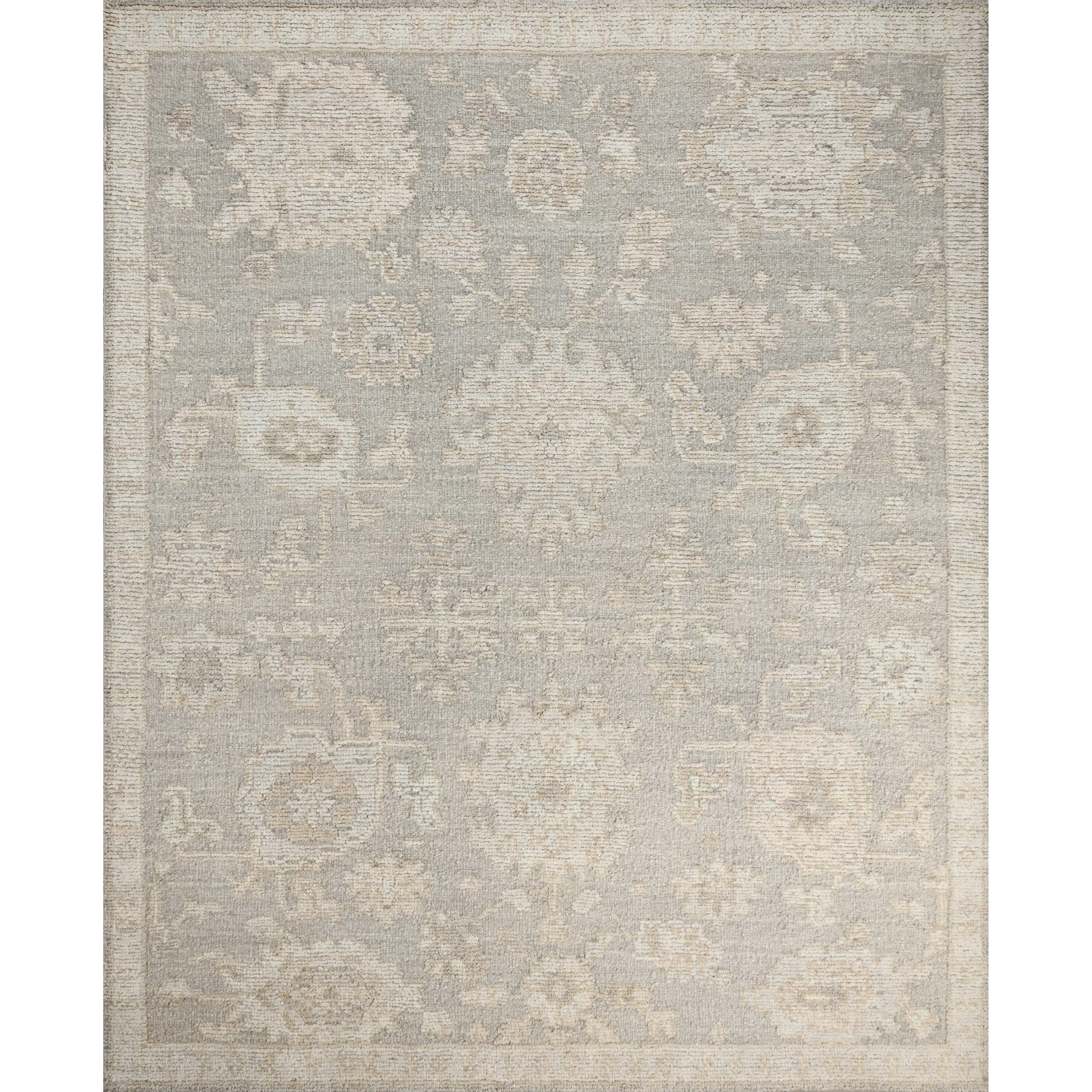 The Adelaide Collection is a cool-toned area rug with asymmetrical motifs that float across the soft wool surface. Restrained in color and dynamic in texture, Adelaideâ€™s variable pile height adds subtle dimension as the light changes throughout the day. Amethyst Home provides interior design, new home construction design consulting, vintage area rugs, and lighting in the San Diego metro area.