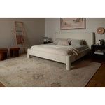 Featuring Adelaide Ivory / Natural Hand-Knotted Rug by Loloi at Amethyst Home. The Adelaide Collection is a cool-toned area rug with asymmetrical motifs that float across the soft wool surface. Restrained in color and dynamic in texture, Adelaideâ€™s variable pile height adds subtle dimension as the light changes throughout the day. Hand-knotted by artisan. Amethyst Home provides interior design, new home construction design consulting, vintage area rugs, and lighting in the Des Moines metro area.