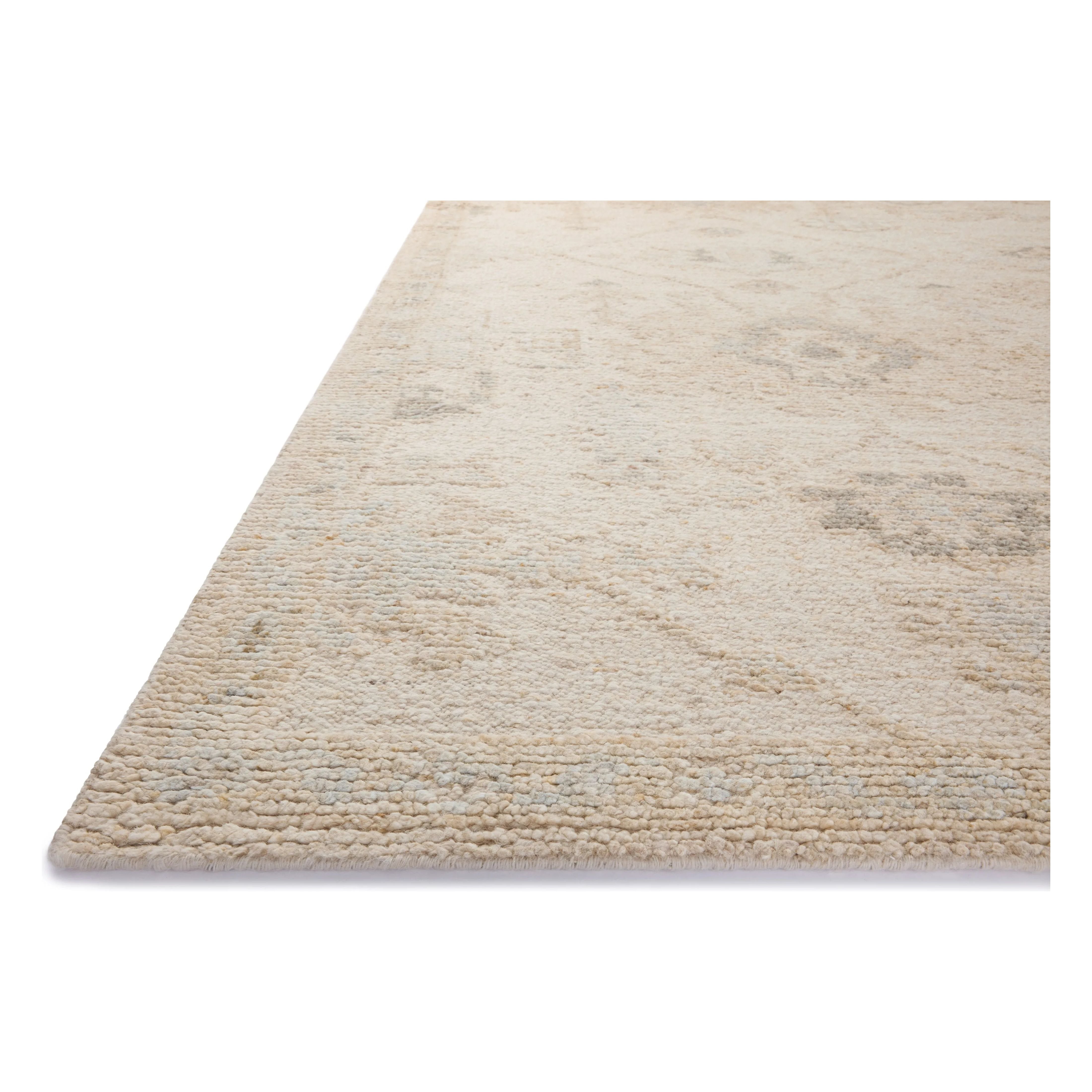 Featuring Adelaide Ivory / Natural Hand-Knotted Rug by Loloi at Amethyst Home. The Adelaide Collection is a cool-toned area rug with asymmetrical motifs that float across the soft wool surface. Restrained in color and dynamic in texture, Adelaideâ€™s variable pile height adds subtle dimension as the light changes throughout the day. Hand-knotted by arti. Amethyst Home provides interior design, new home construction design consulting, vintage area rugs, and lighting in the Newport Beach metro area.
