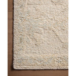 Featuring Adelaide Ivory / Natural Hand-Knotted Rug by Loloi at Amethyst Home. The Adelaide Collection is a cool-toned area rug with asymmetrical motifs that float across the soft wool surface. Restrained in color and dynamic in texture, Adelaideâ€™s variable pile height adds subtle dimension as the light changes throughout the day. Hand-knotted by artisan. Amethyst Home provides interior design, new home construction design consulting, vintage area rugs, and lighting in the Scottsdale metro area.